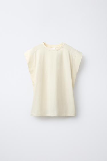 CAMISETA LISA PESTAÑA - Mantequilla de Zara