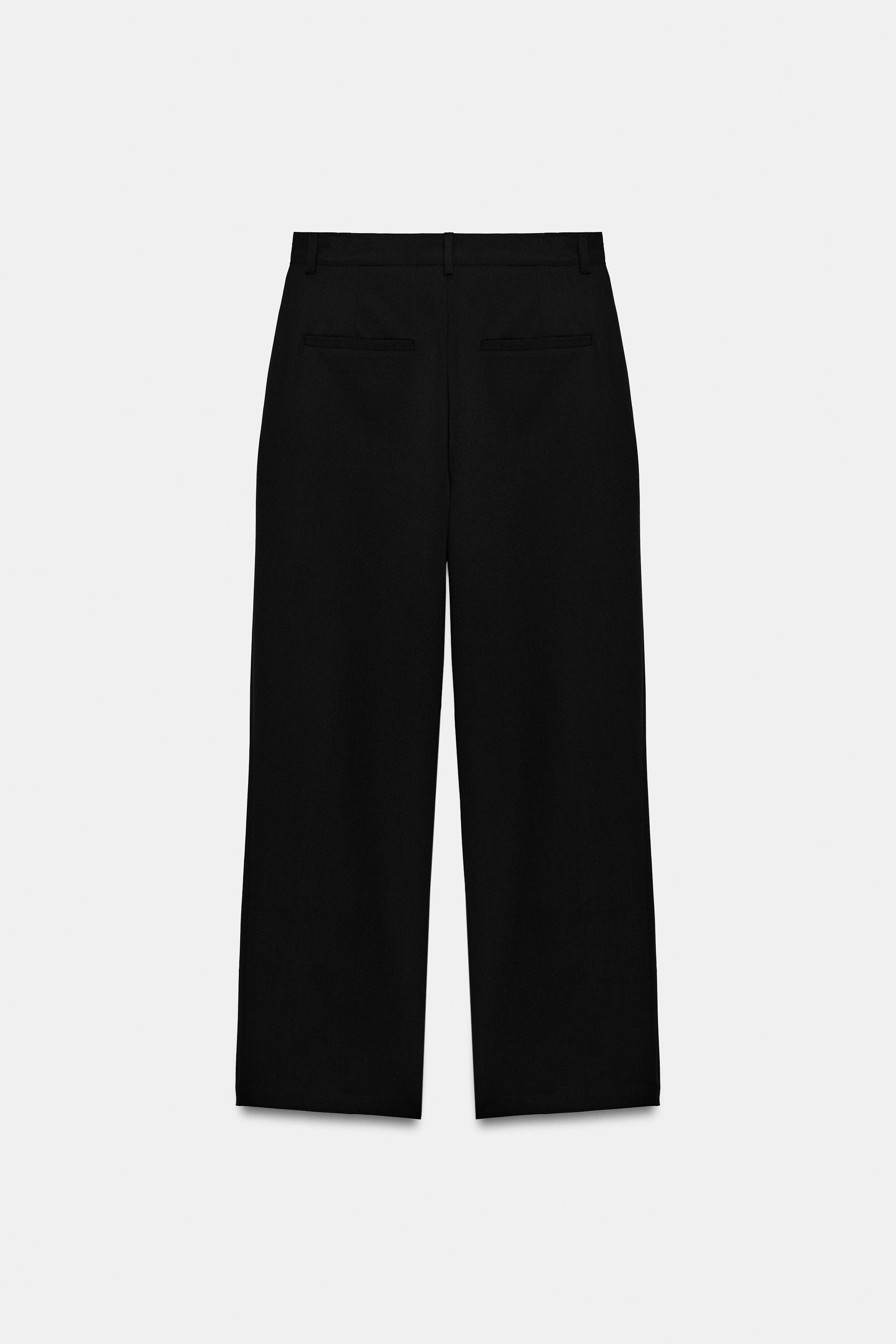 STRIPED PLEATED PANTS