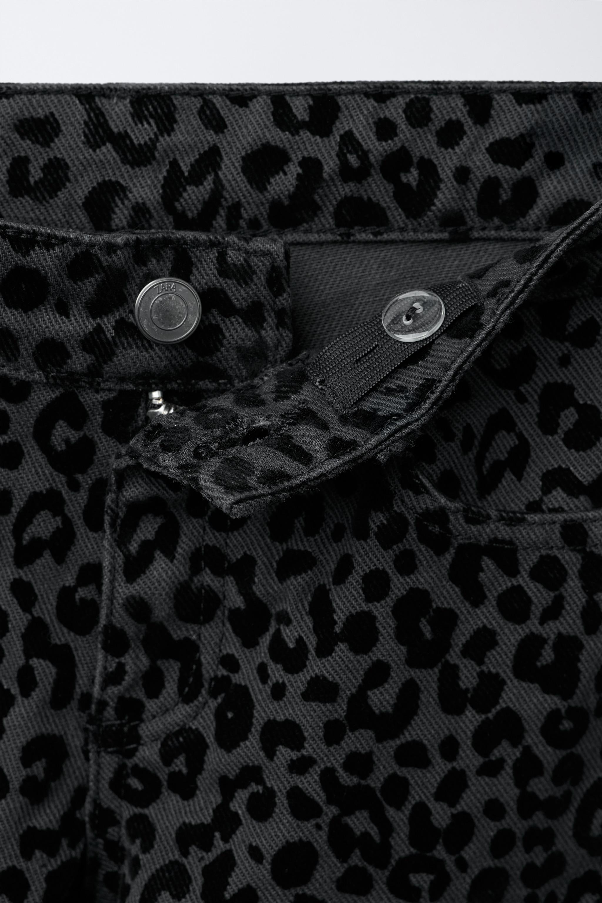 FLOCKED ANIMAL PRINT WIDE LEG JEANS