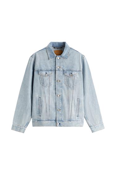 Front view of a light blue denim jacket with button fastening and front flap pockets.