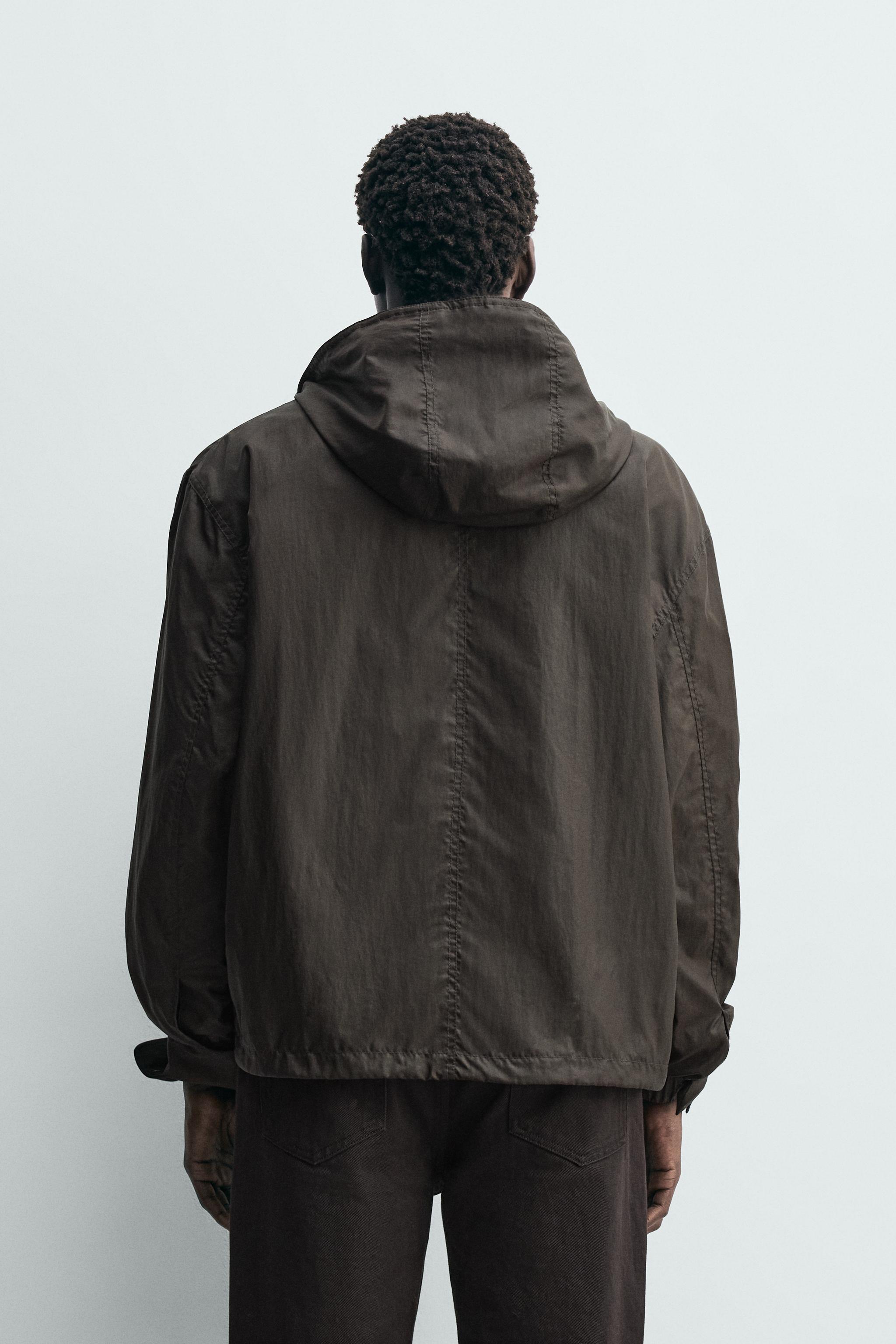 BLOUSON TECHNIQUE À CAPUCHE