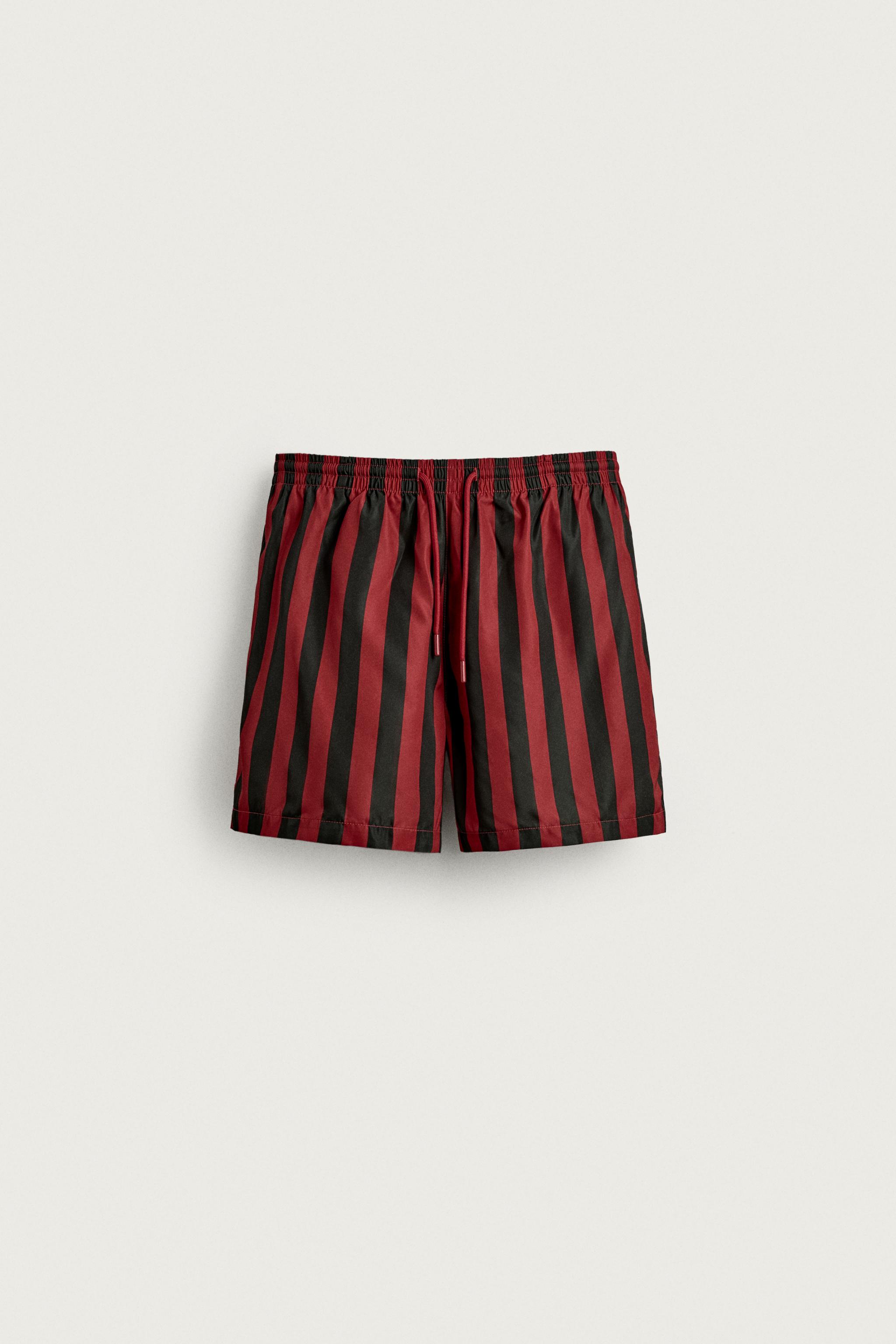 STRIPED MID-LENGTH SWIM SHORTS — Red