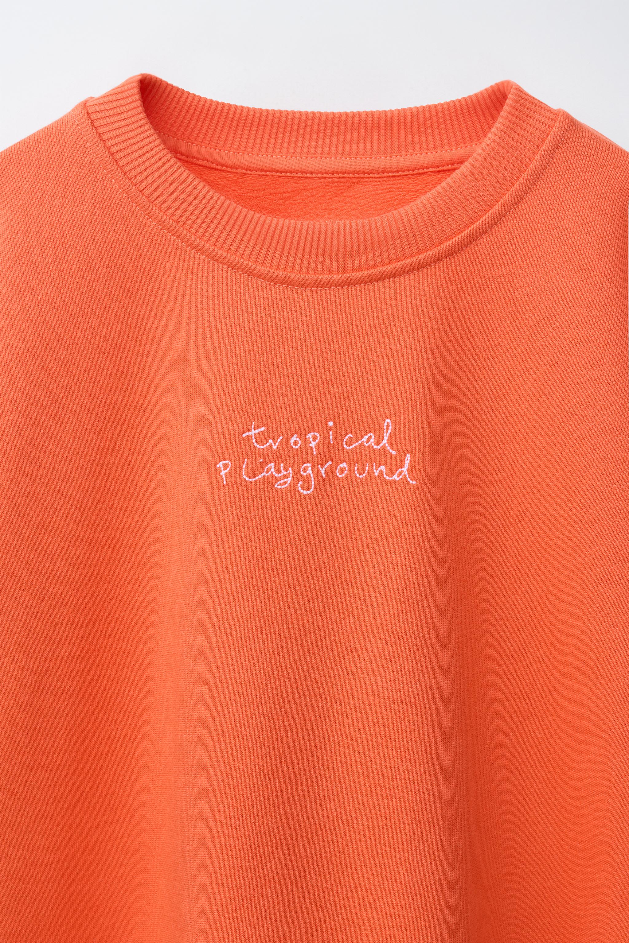 SWEAT À INSCRIPTION BRODÉE
