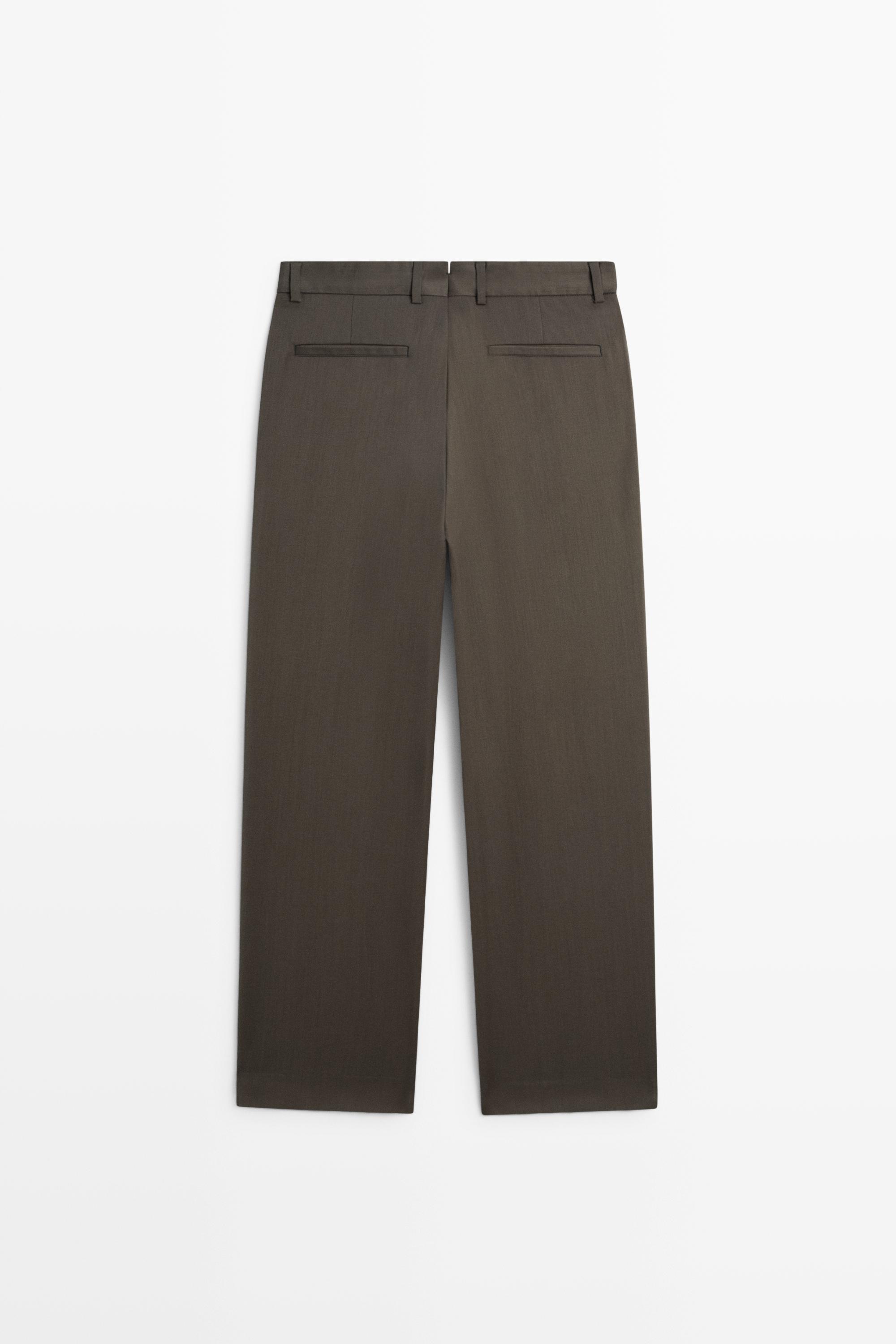 Pantalon relaxed fit à pinces 100 % laine froide