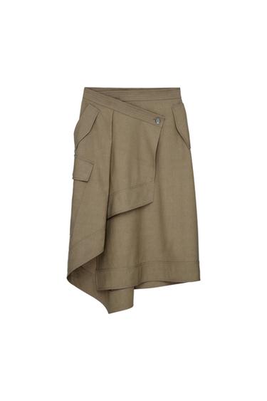 Khaki midi skirt with an asymmetric wrap design, button fastening and side flap pockets on a white background.