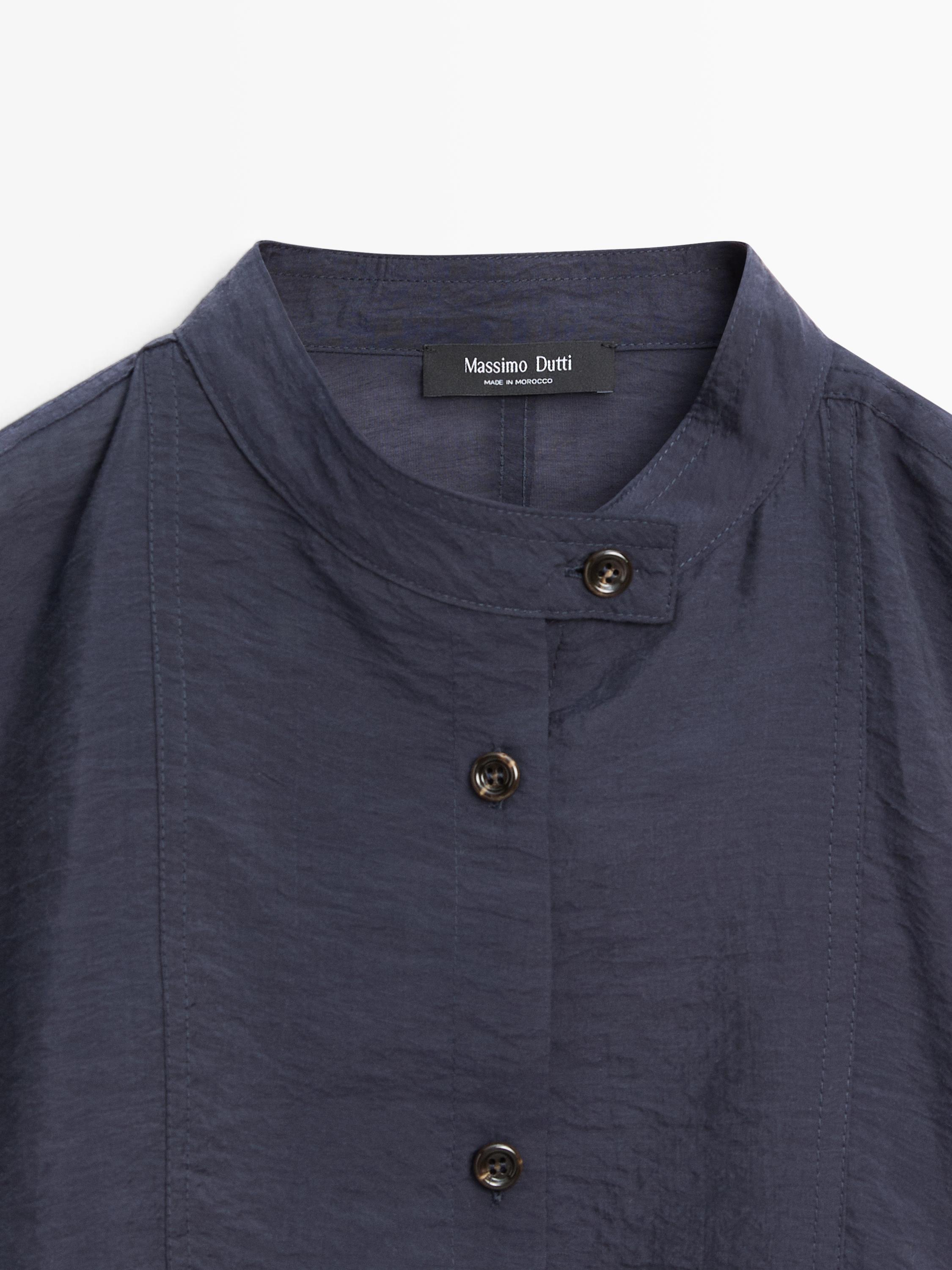 Stand collar bomber jacket with button details