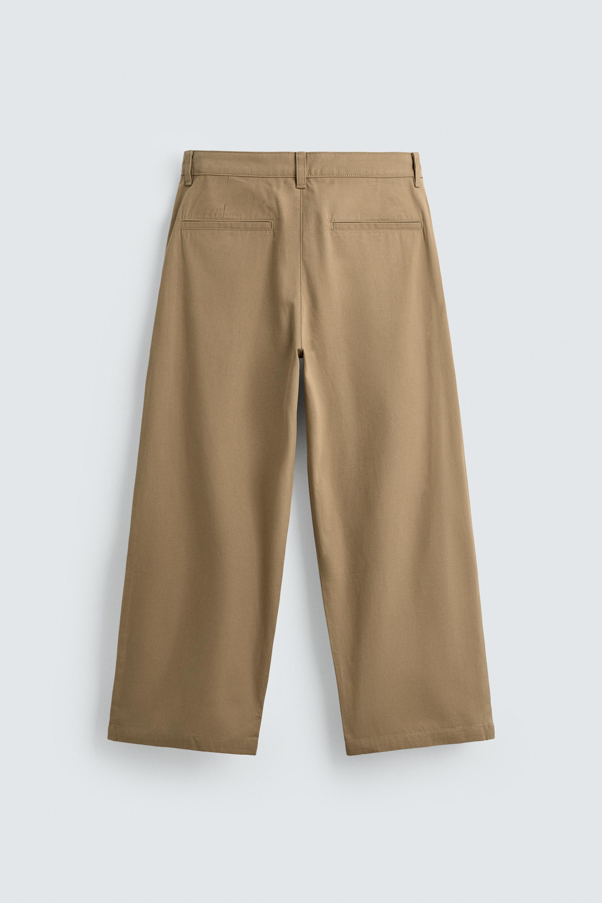 PANTALON COUPE LARGE À PLIS