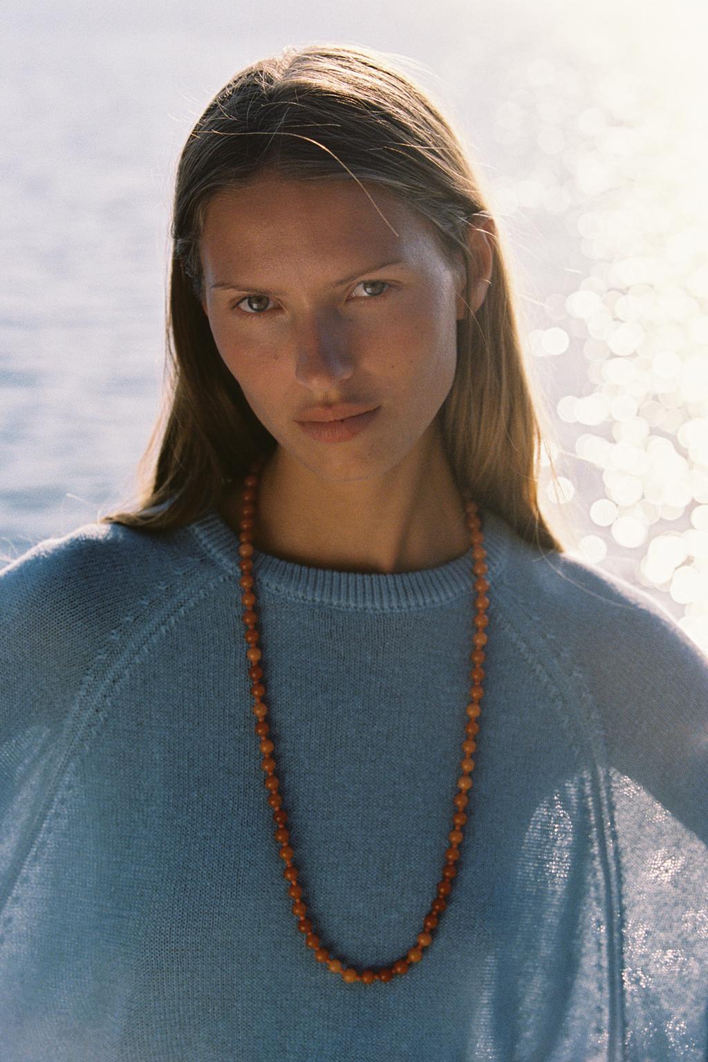 WIDE SLEEVE KNIT SWEATER