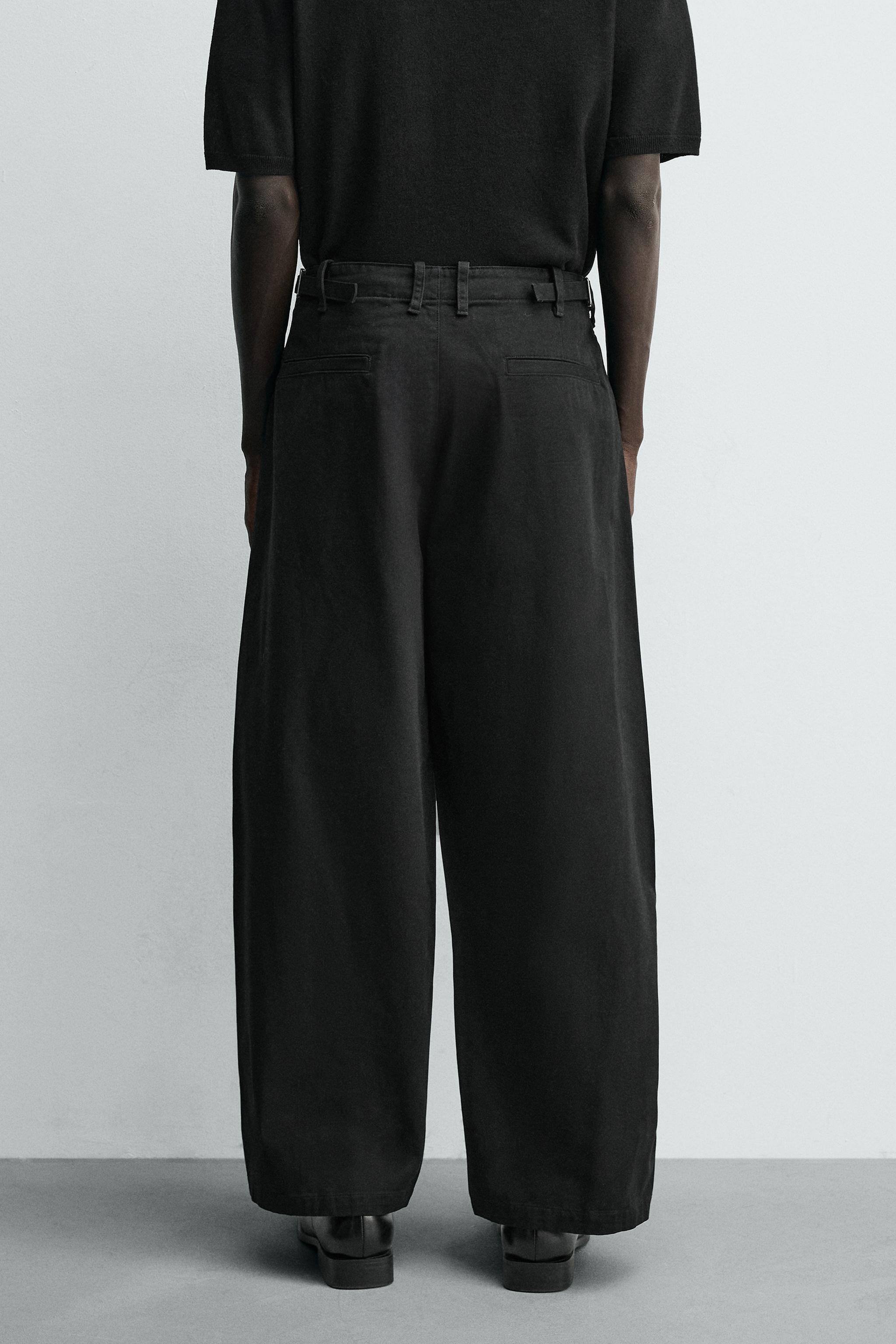RELAXED BALLOON FIT PLEATED PANTS