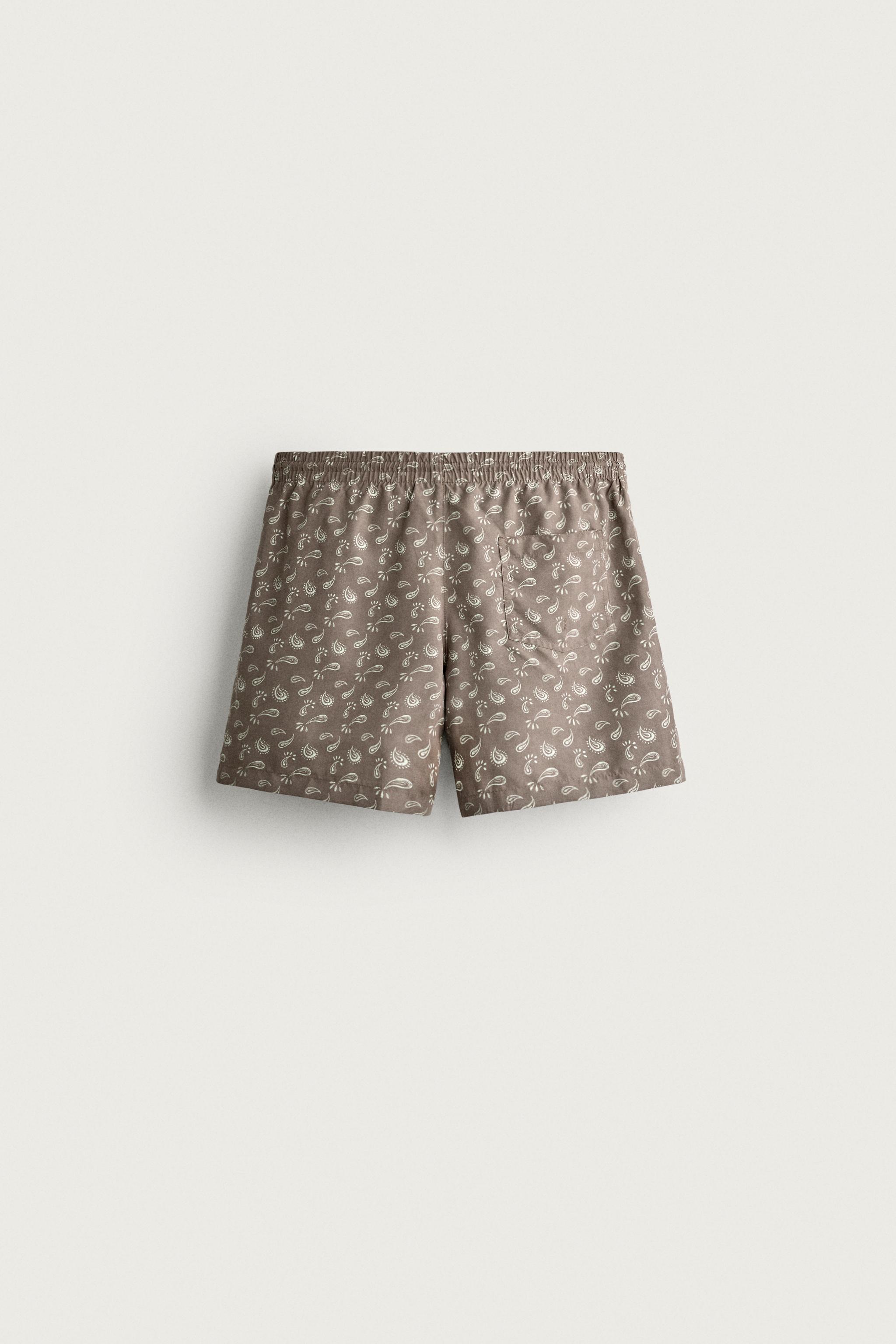 PAISLEY PRINT MID-LENGTH SWIM TRUNKS