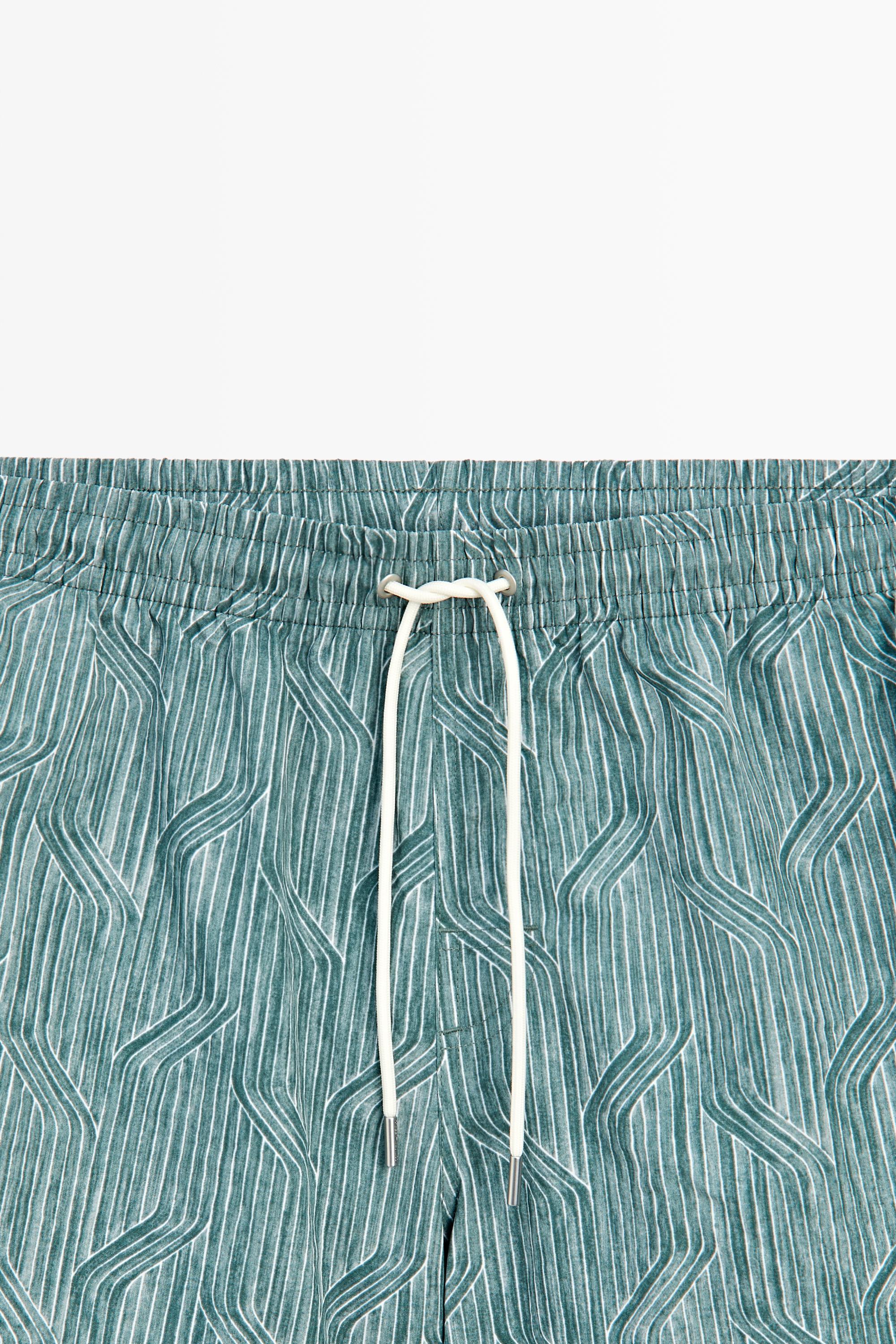 Printed swimming trunks — Sea green