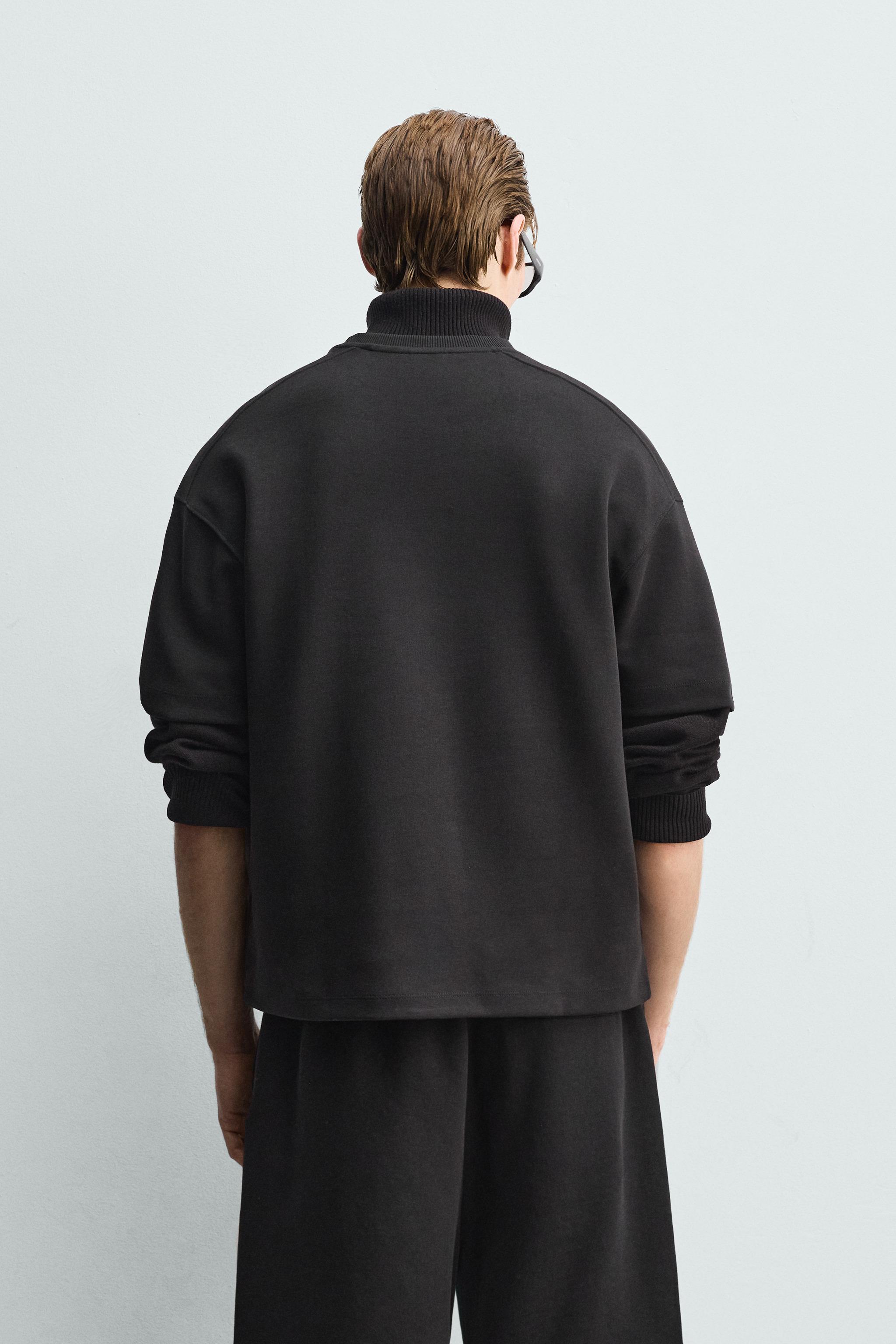 RELAXED FIT INTERLOCK SWEATSHIRT