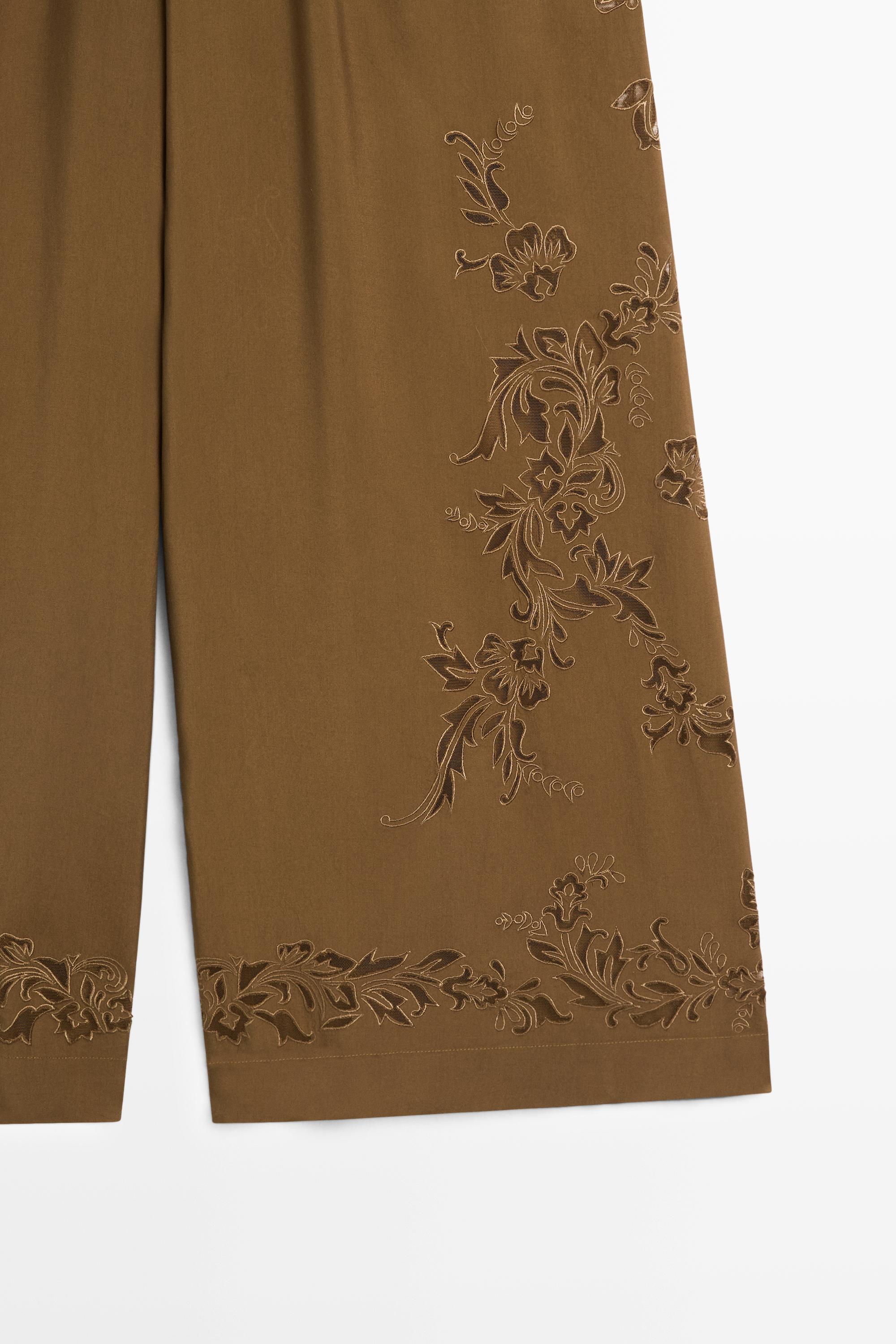Flowing wide-leg pants with embroidery details