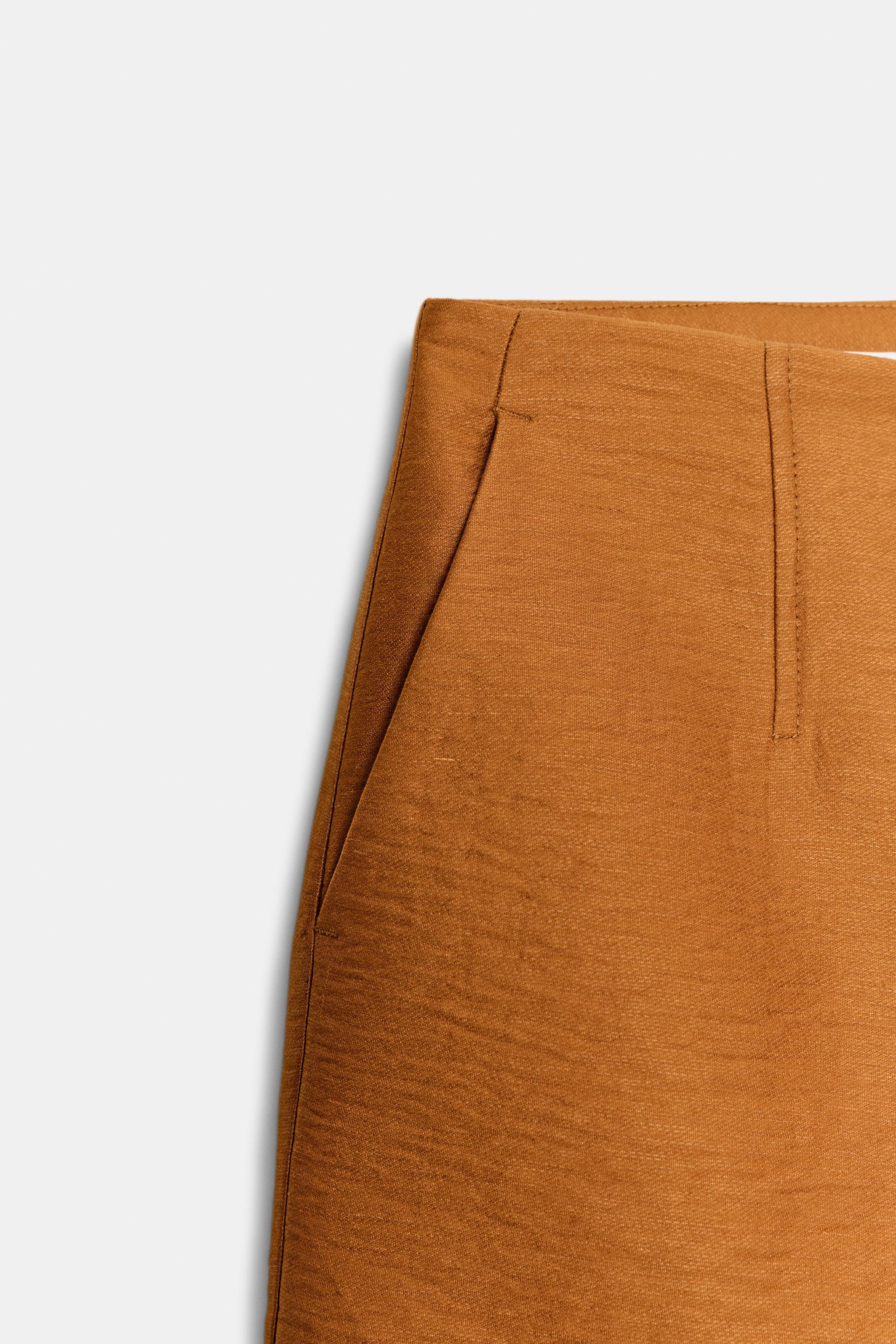 LINEN SHORTS WITH COVERED BUTTON