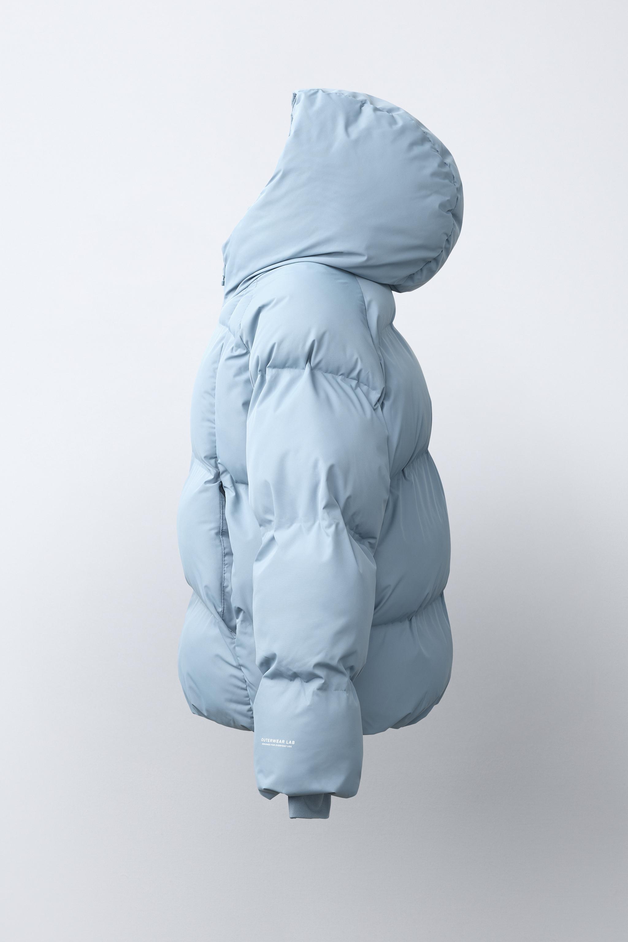 BLOUSON REMBOURRÉ À CAPUCHE DÉPERLANT
