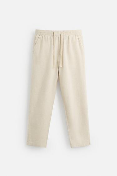 بنطلون RELAXED FIT قطن - كتان - بيج فاتح الخاص بـ Zara