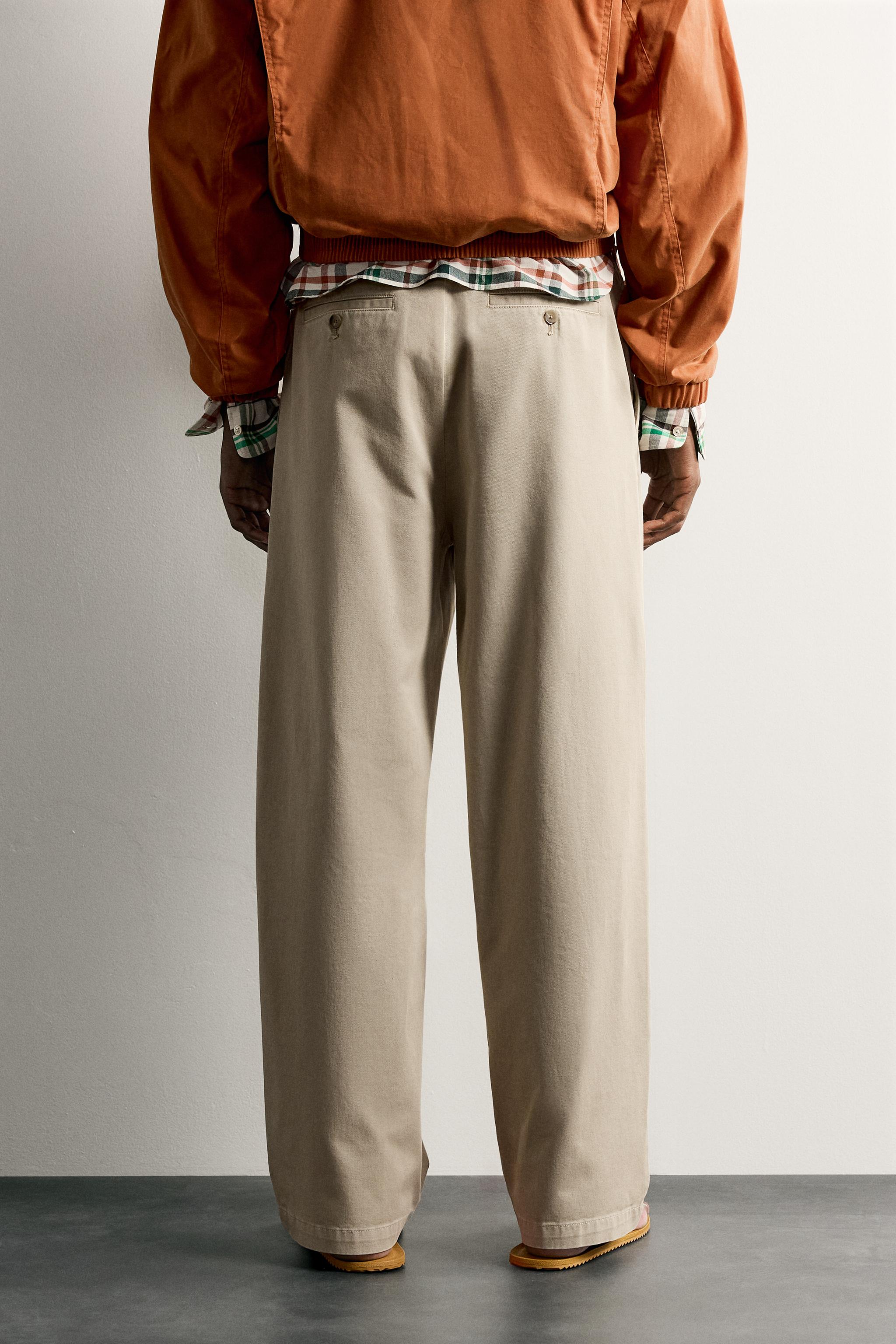 RELAXED FIT PLEATED CHINO PANTS