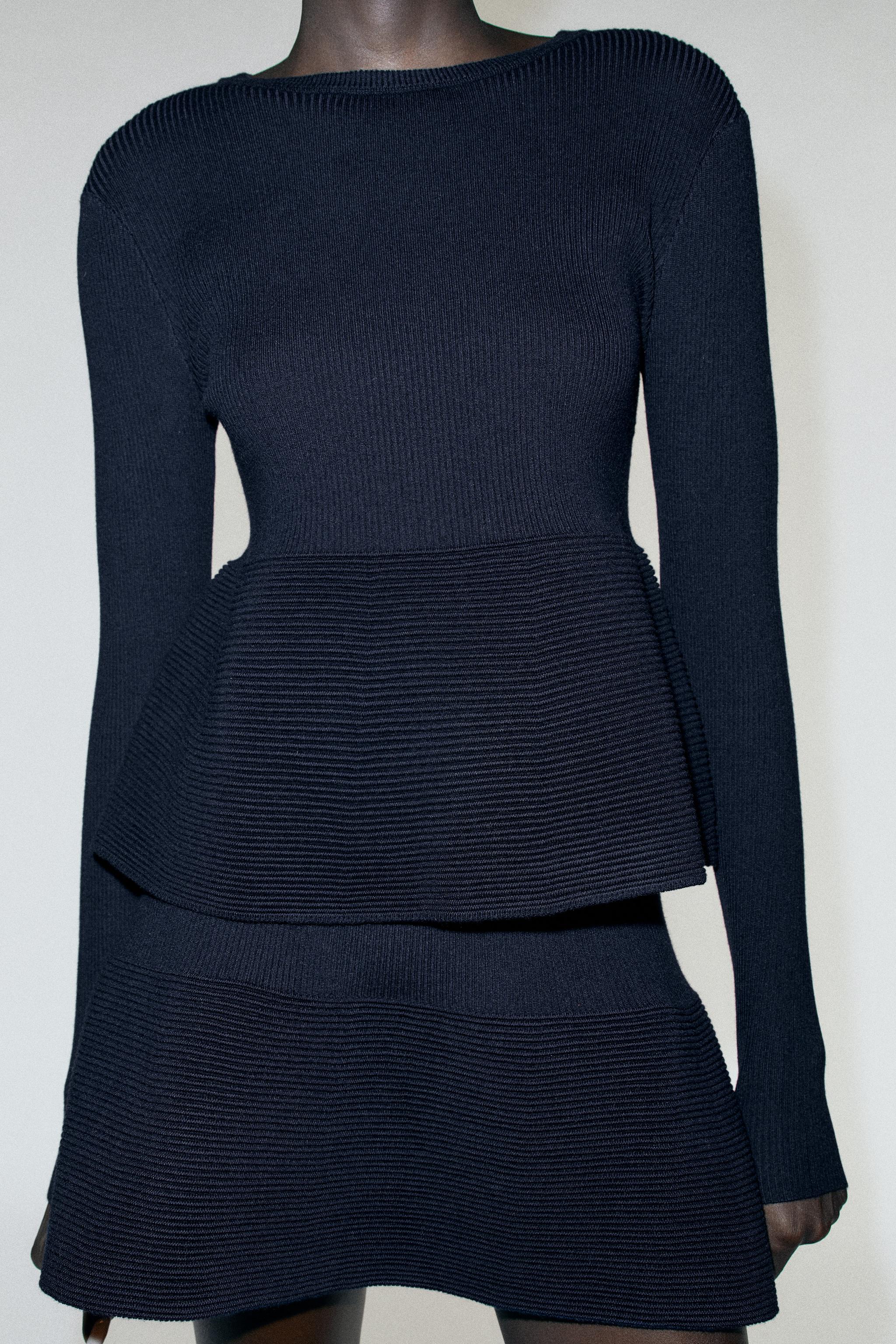 PULL EN MAILLE PEPLUM