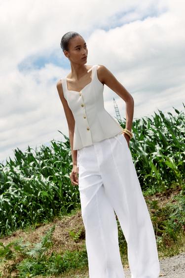 TOP STRETCH PEPLUM - Blanco roto de Zara