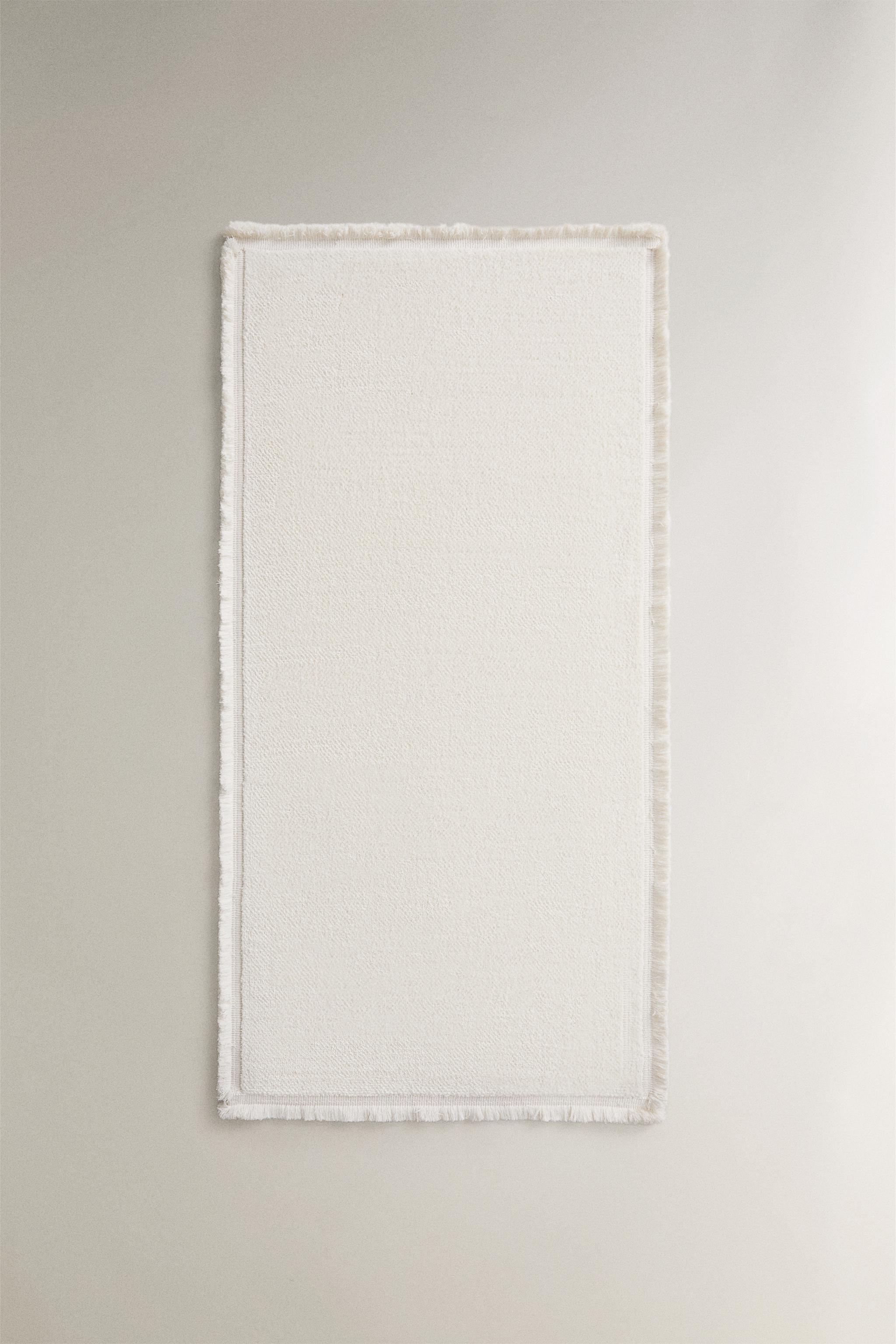 FRINGED RUG — Oyster-white