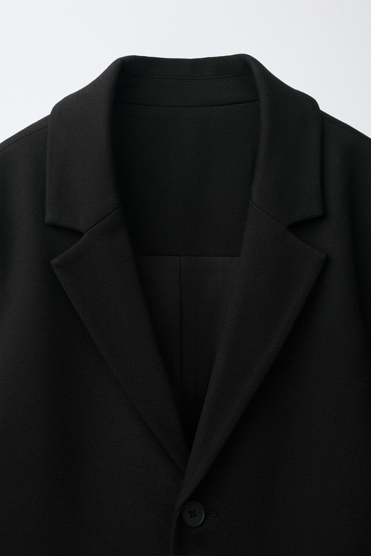 Blazer de traje liso 4