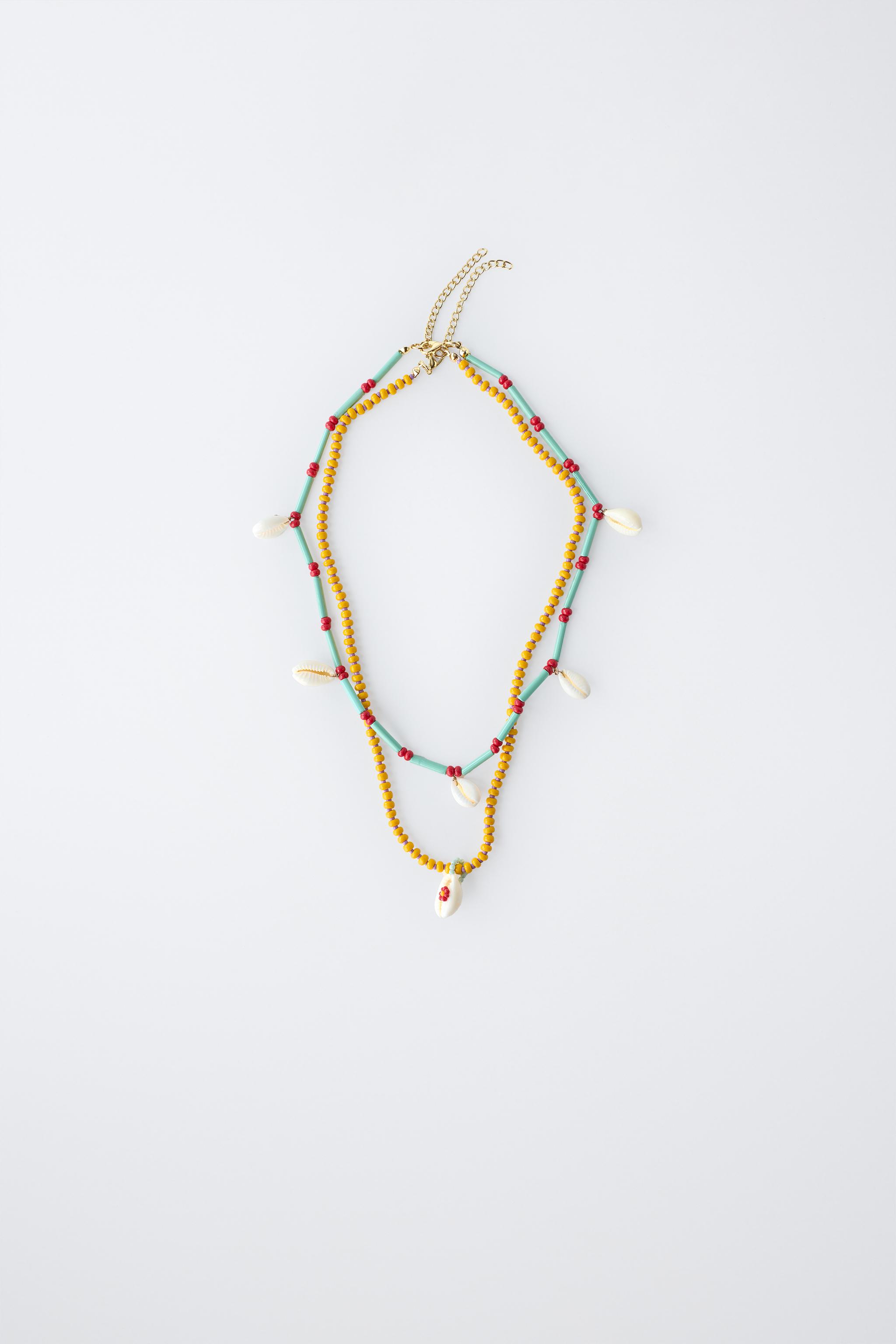 PACK OF TWO BEADED SHELL NECKLACES