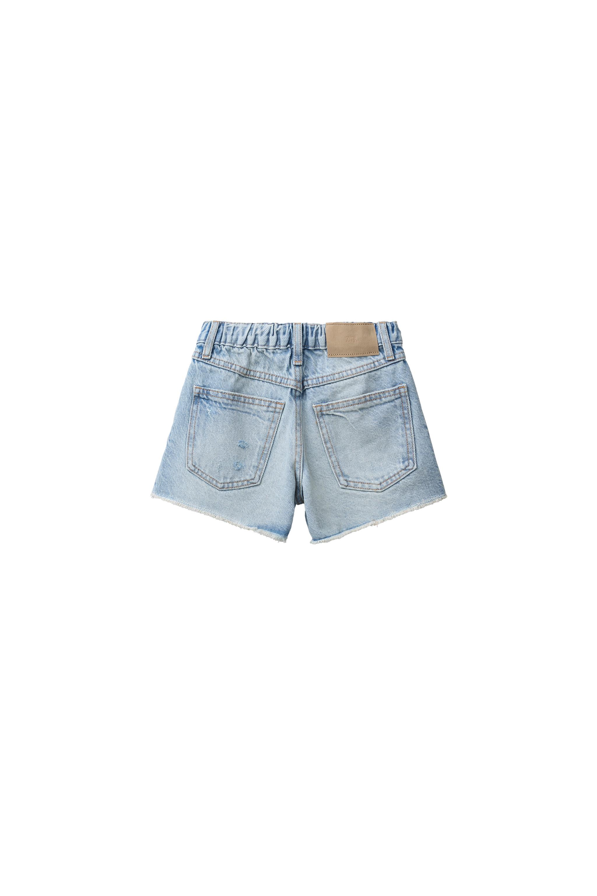 RIPPED DENIM SHORTS — Light blue