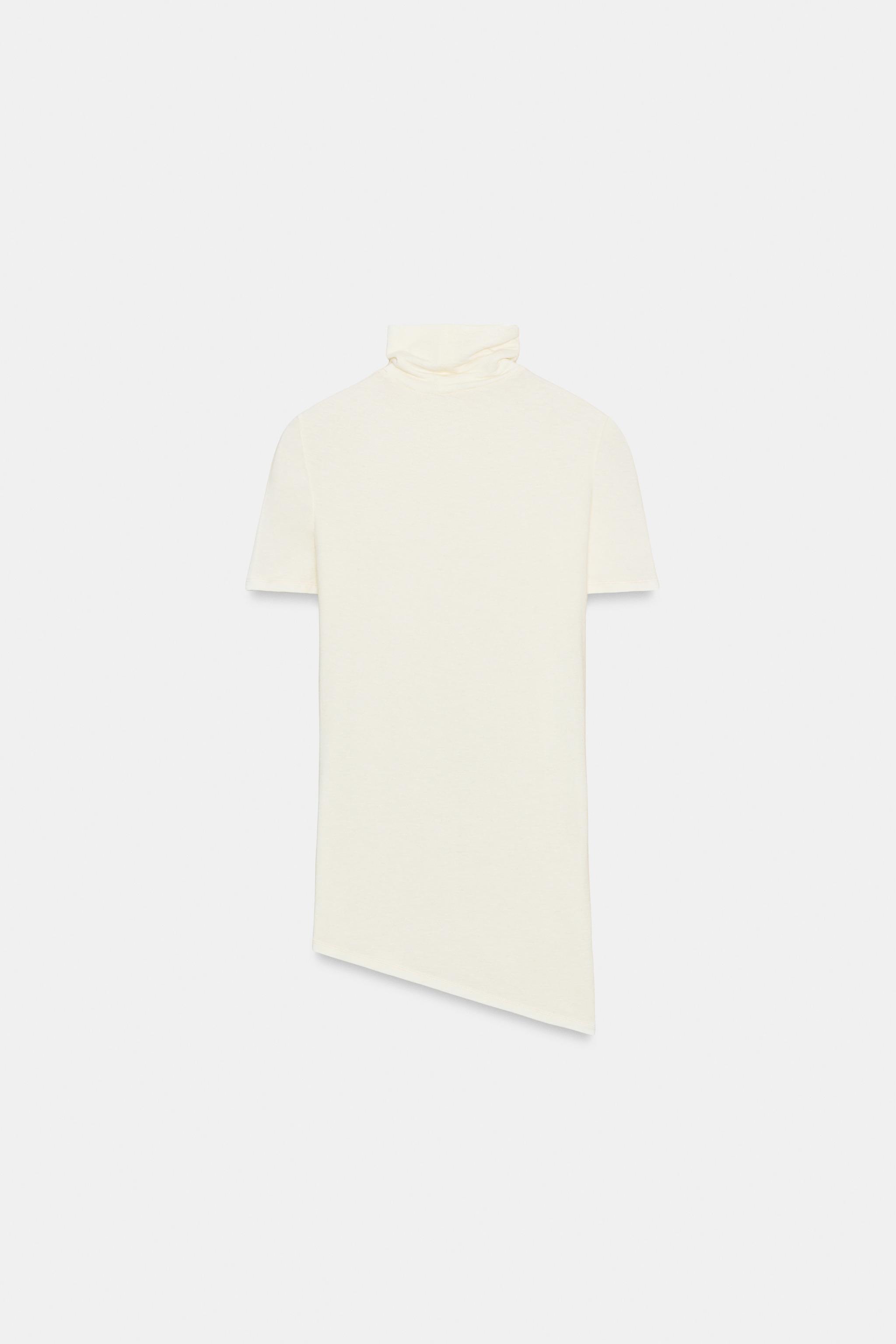 HAUT ASYMÉTRIQUE À COL ROULÉ