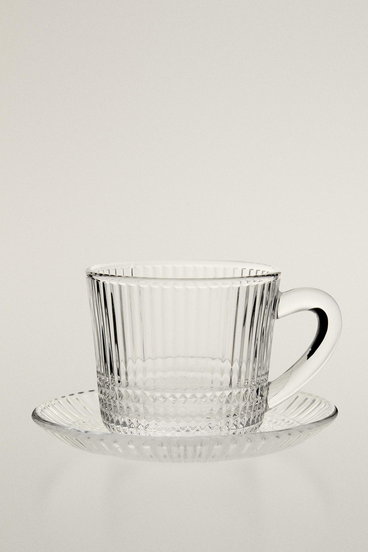 GLASS COFFEE CUP WITH SAUCER AND RAISED GEOMETRIC DESIGN. — Transparent