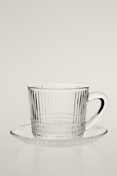 GLASS COFFEE CUP WITH SAUCER AND RAISED GEOMETRIC DESIGN. — Transparent 1
