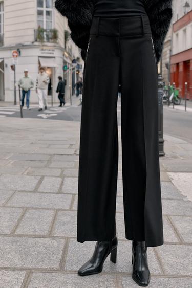 PANTALÓN BOLSILLOS CREMALLERAS - Negro de Zara