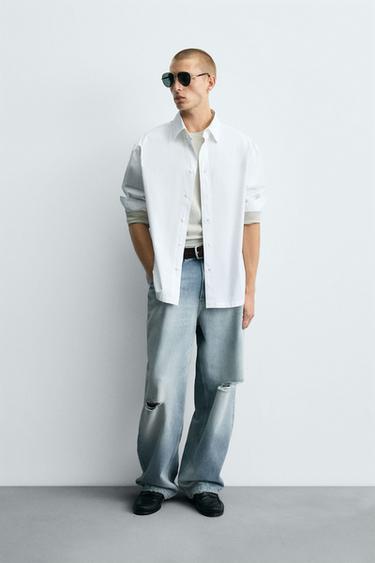 RIPPED BAGGY FIT JEANS - Light blue by Zara