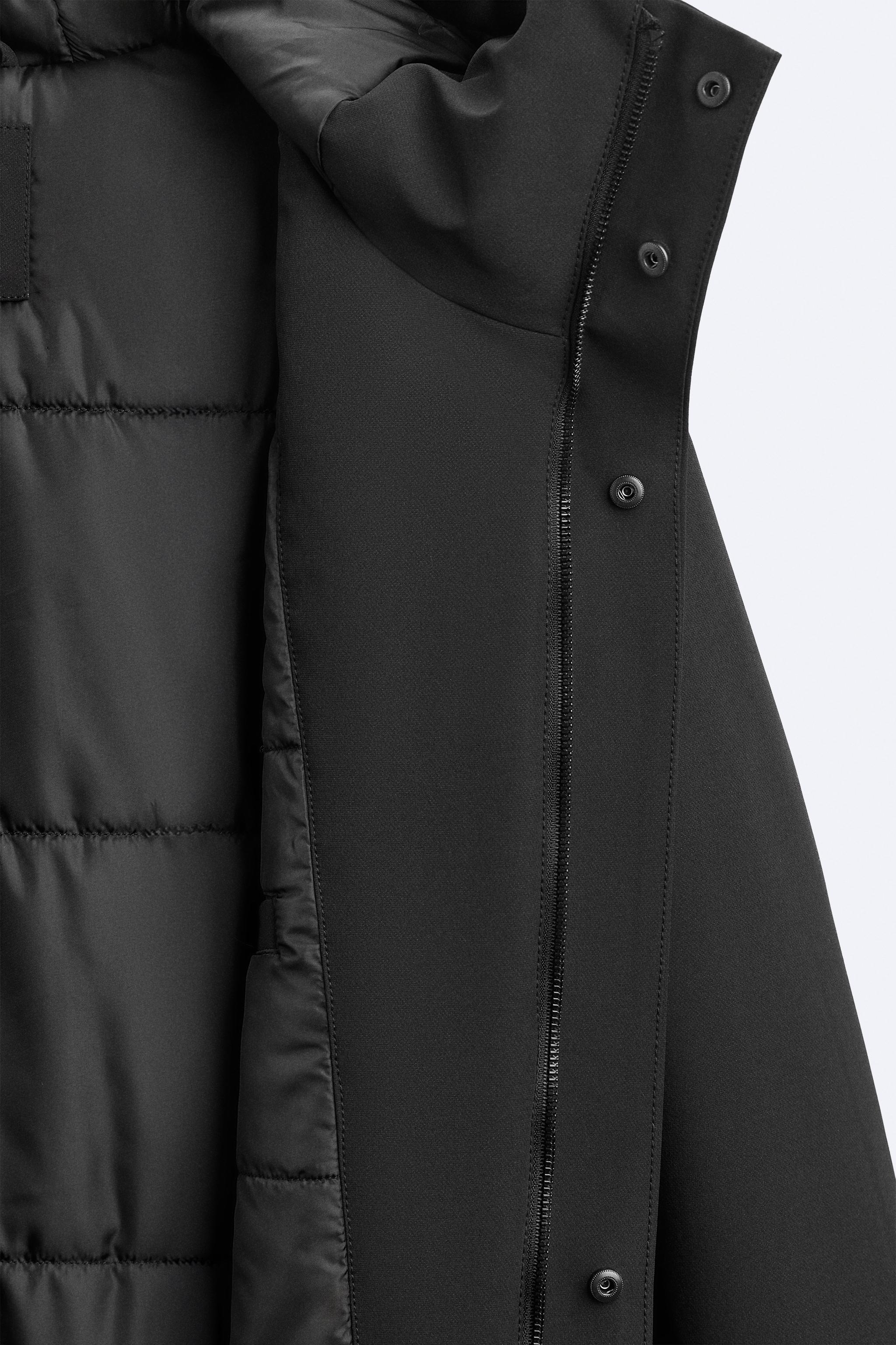 HOODED TECHNICAL JACKET