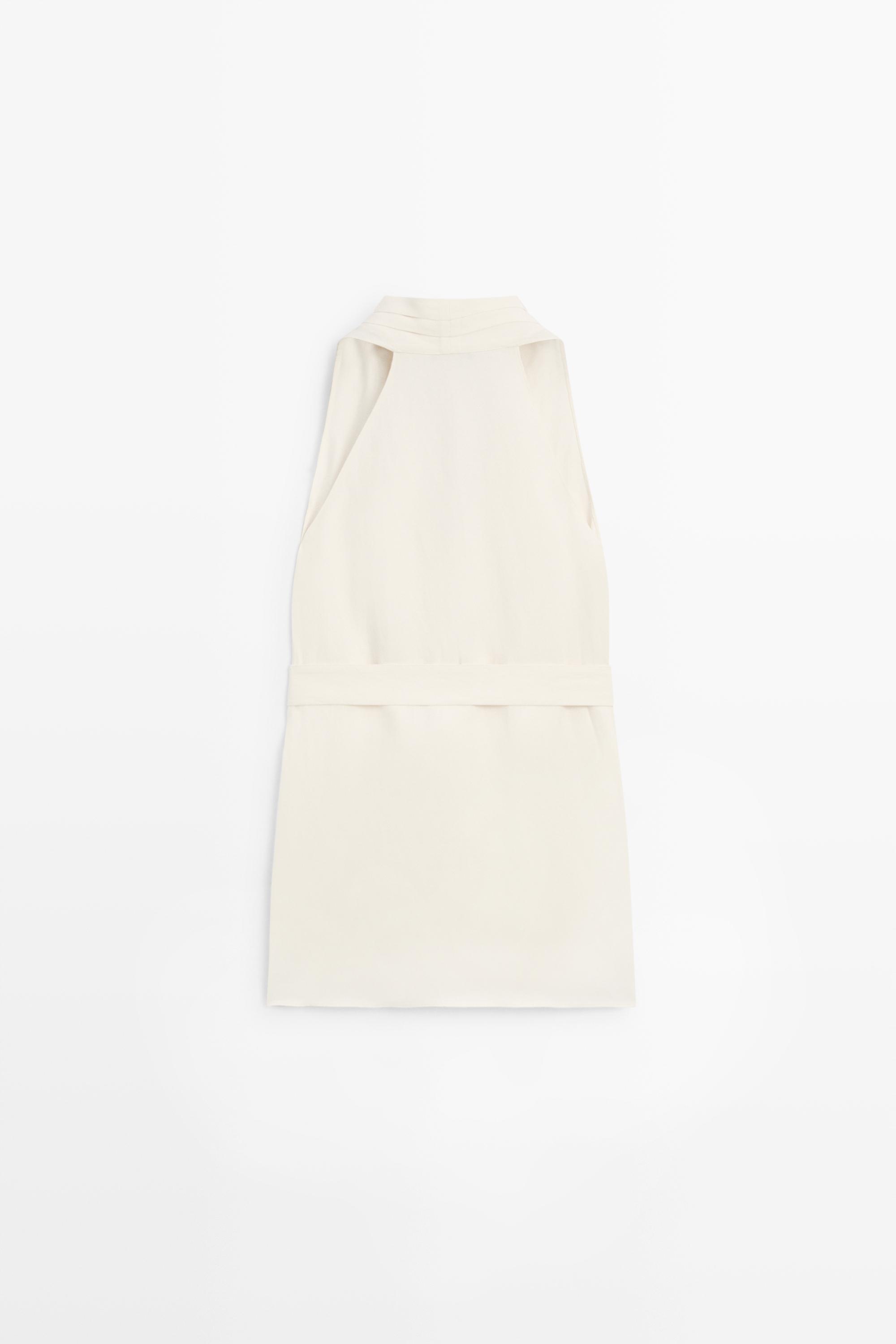 Flowing linen blend vest with belt detail