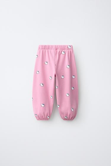 HELLO KITTY © SANRIO FLEECE PANTS — Faded pink 2
