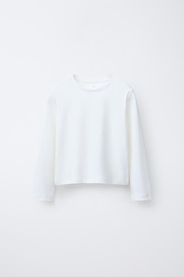 T-SHIRT AVEC GILET ET CLOUS - Écru de Zara - Image 1