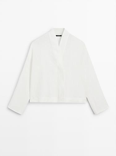 Blusa fluida escote cruzado lino - Blanco de Zara - Imagen 0