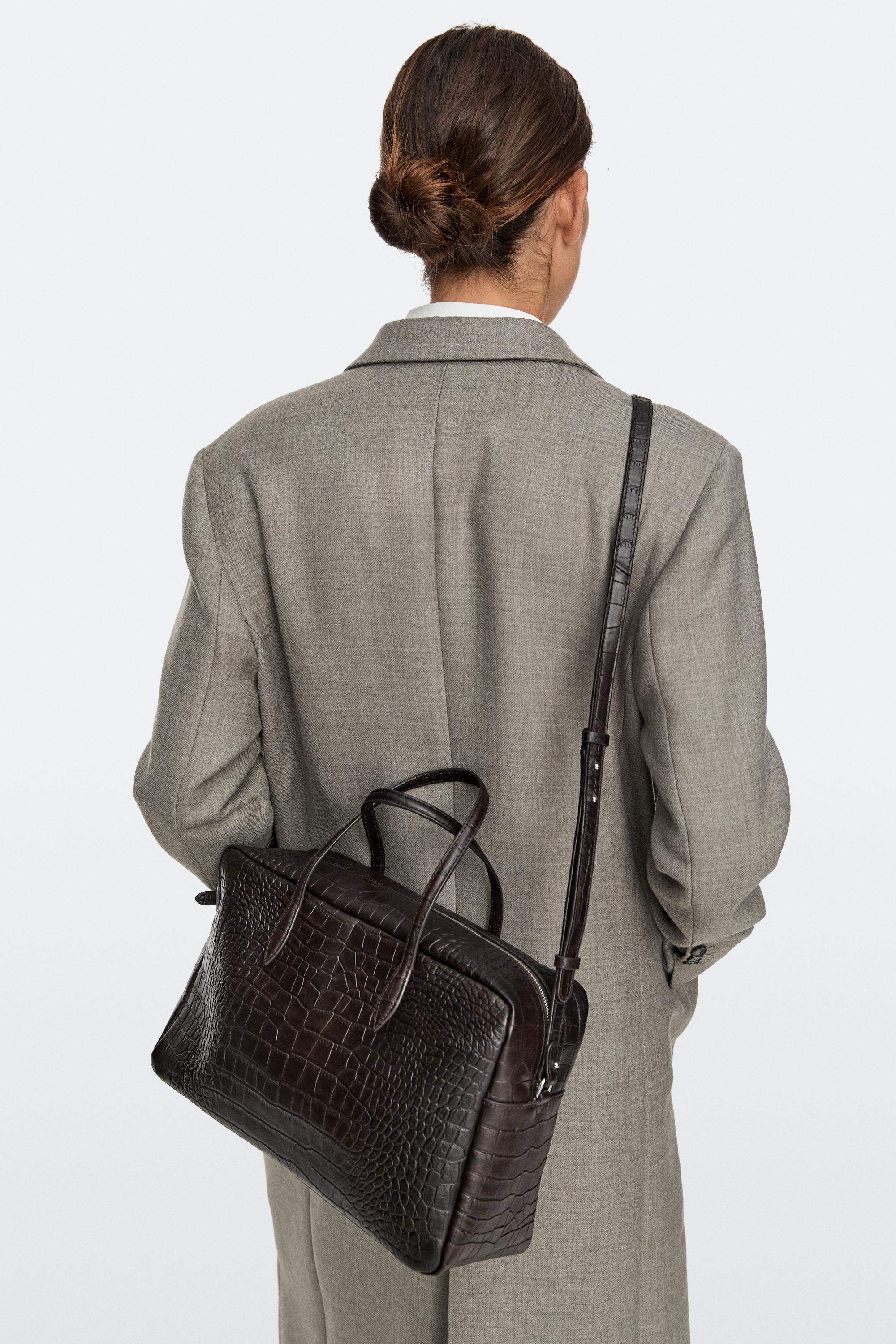 Medium leather textured duffle bag