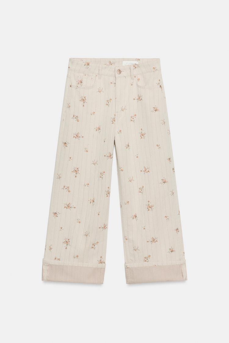 JEANS DE TIRO MEDIO Y CORTE AFINADO CON FLORES 8