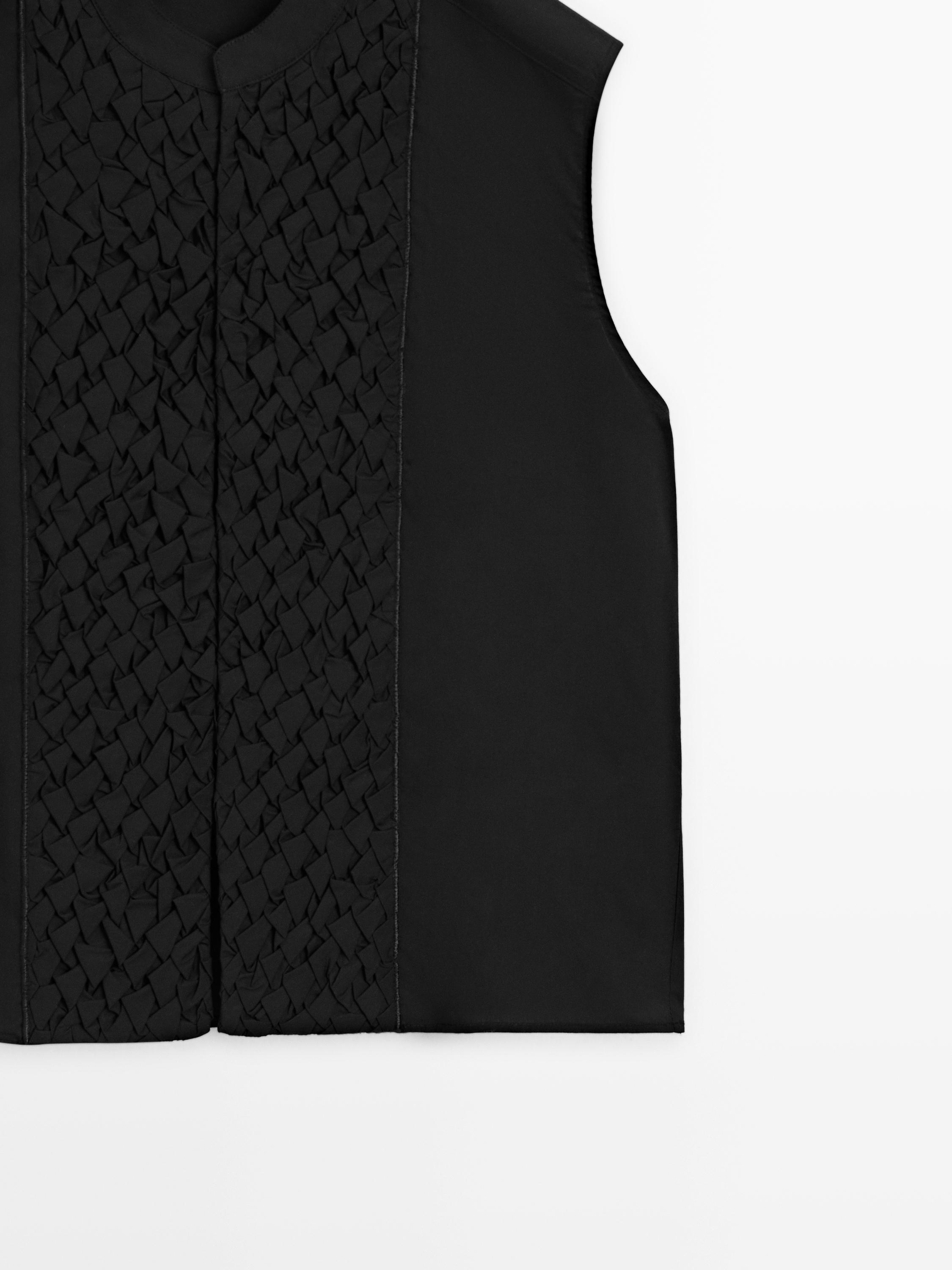 Veste sans manches en coton à plastron