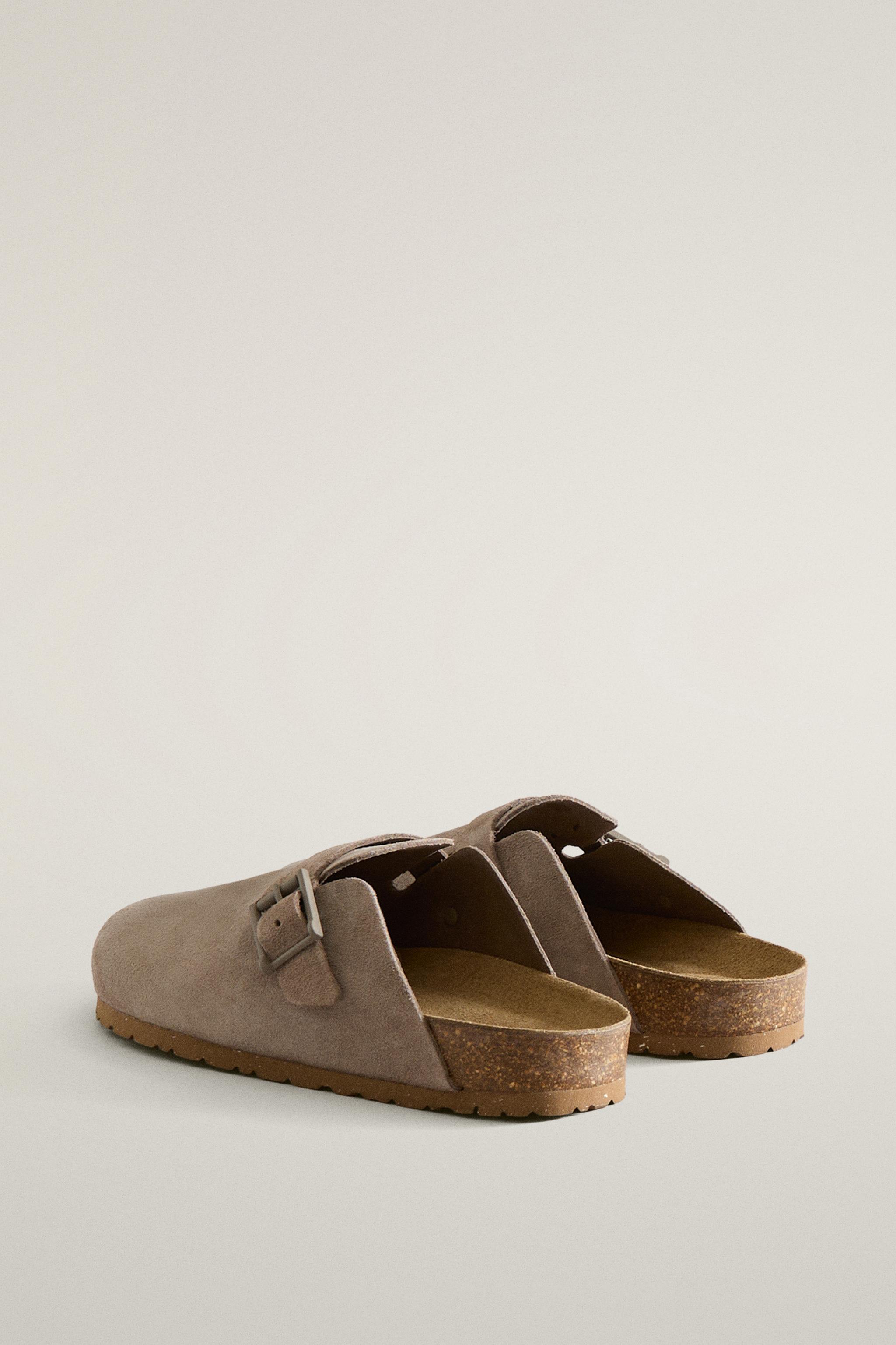 SABOT EN CUIR À BOUCLE ET SURPIQÛRES