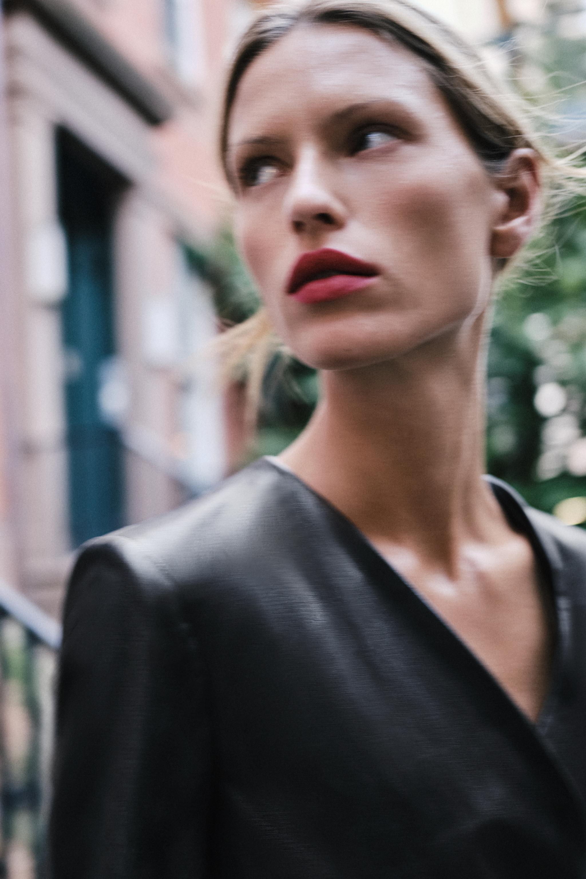 FAUX-LEATHER EFFECT DRESS WITH GOLD APPLIQUÉ