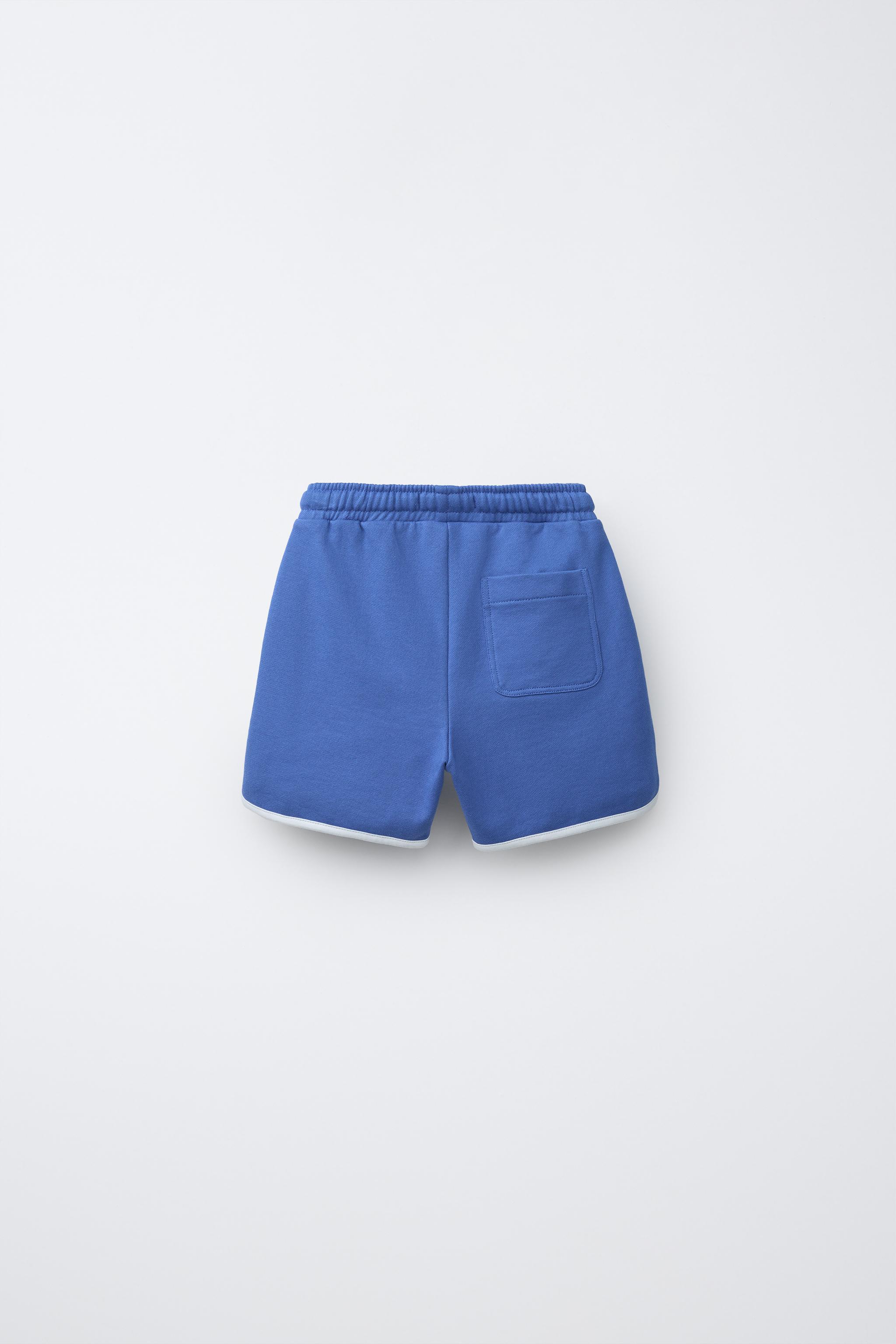 SHORT DE JOGGING À LISERÉS