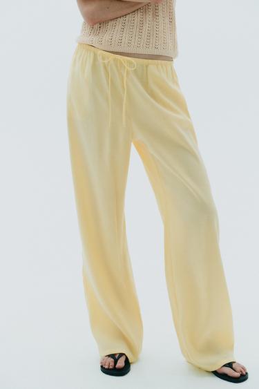 БРЮКИ ИЗ СТРУЯЩЕЙСЯ ТКАНИ — ЖЕЛТЫЙ от Zara