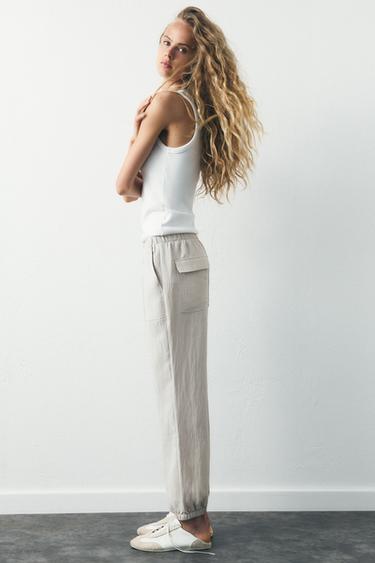 PANTALÓN JOGGER FLUIDO - Perla vigoré de Zara
