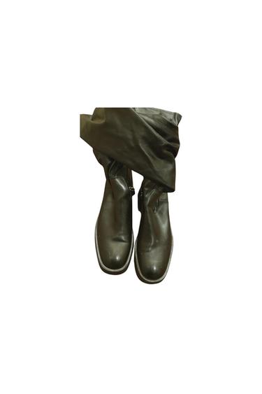 FLAT OVER THE KNEE BOOT NWOT HAS A SCRATCH THAT IS A SPOT ON THE FRONT PLEASE VIEW IMAGES