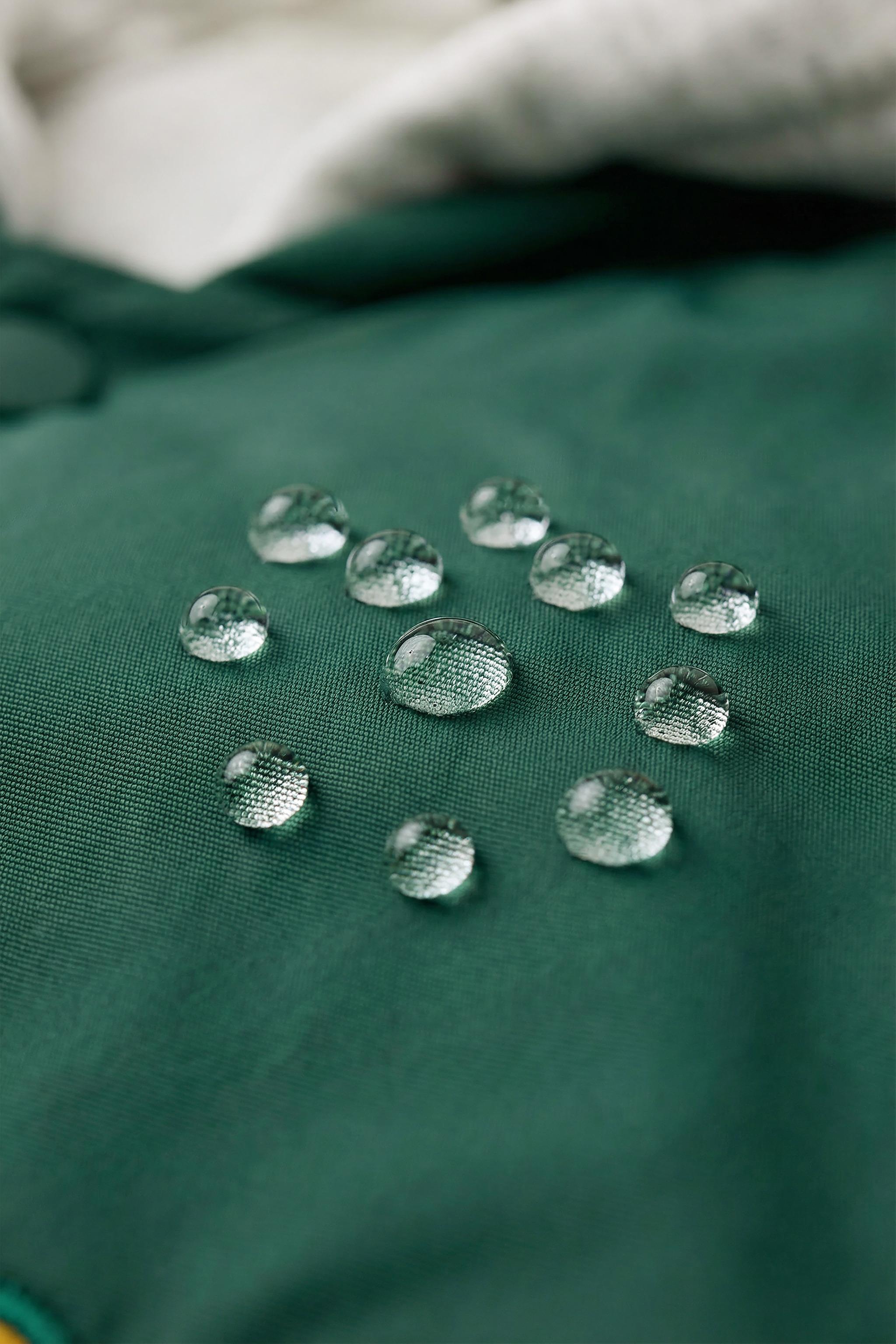 BLOUSON BOMBER CAPUCHE EN MOLLETON AMOVIBLE DÉPERLANT