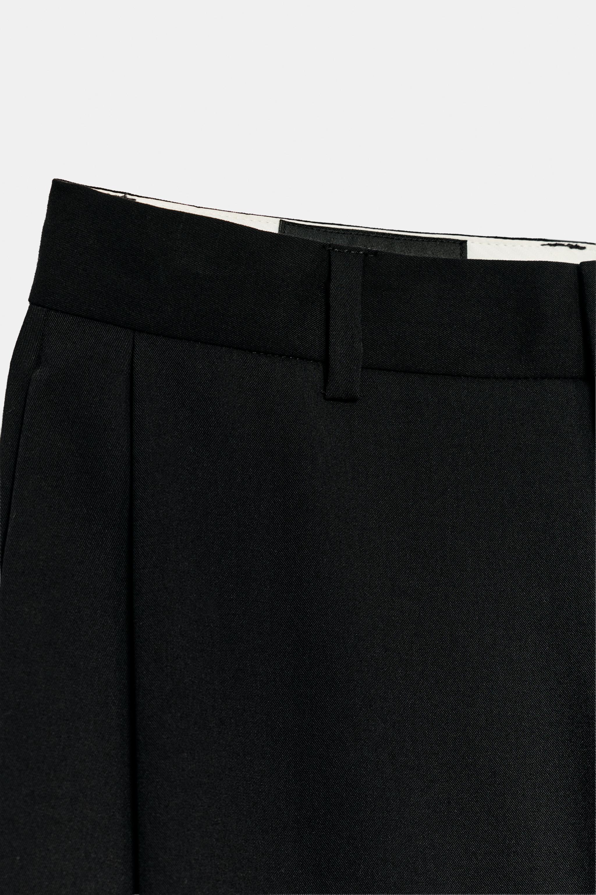 STRIPED PLEATED PANTS
