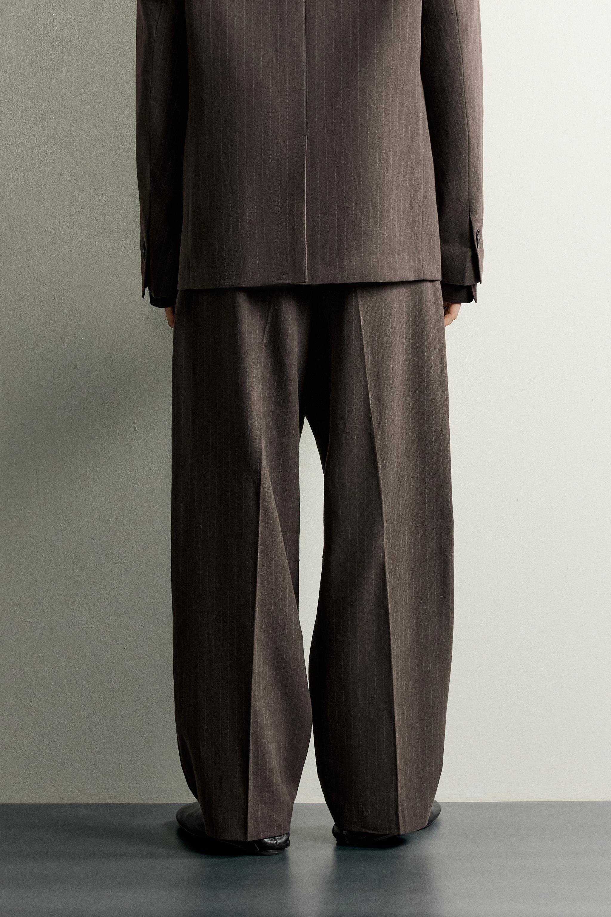 PINSTRIPE PLEATED SUIT PANTS