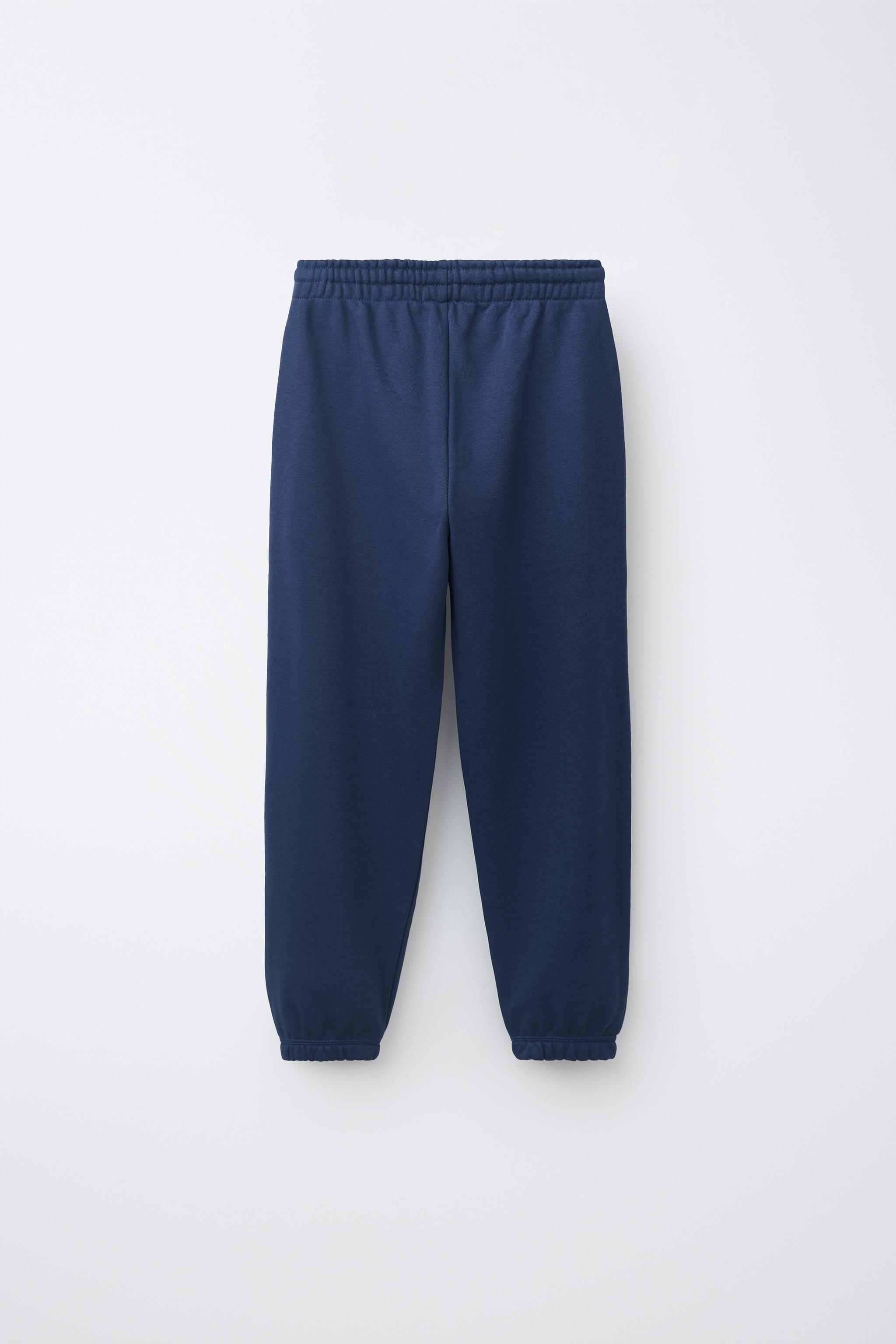 LOT DE DEUX PANTALONS EN MOLLETON